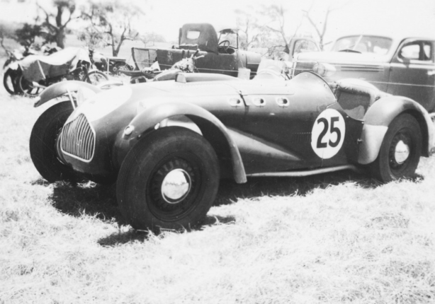 The Hawkes Allard in the Collingrove paddock March 1952. The modifications referred to in the text are not yet evident, this is early in Hawkes ownership of the car. Compare with the other later Collingrove shot below and the Sellicks Beach shot above where the car is running sans guards and with the wire wheels referred to in the text. (State Library of SA)