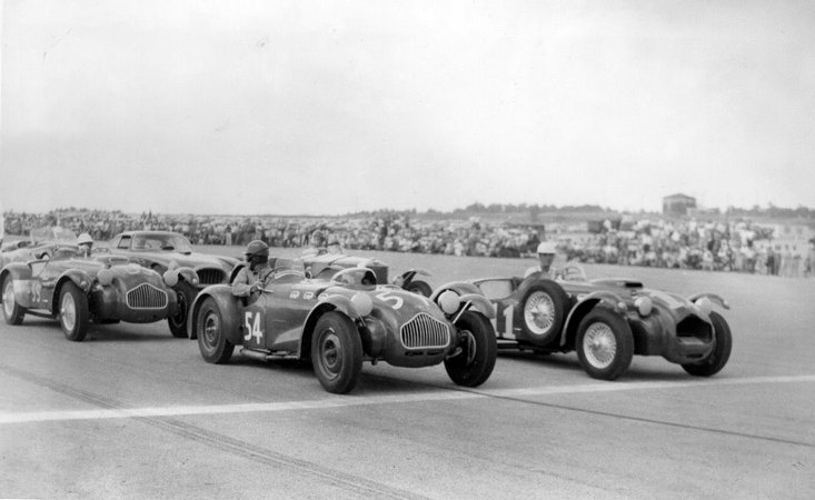 Dale Duncan in #54 and Carroll Shelby in #11
