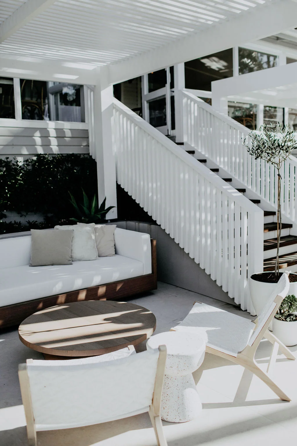 Ivy Road Photography | Poolside styling at Fig Tree feat. our new White Lounge Chairs and Terrazzo Stools