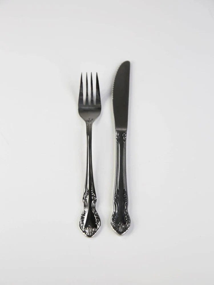 Silver Ornate Cutlery Set | $4