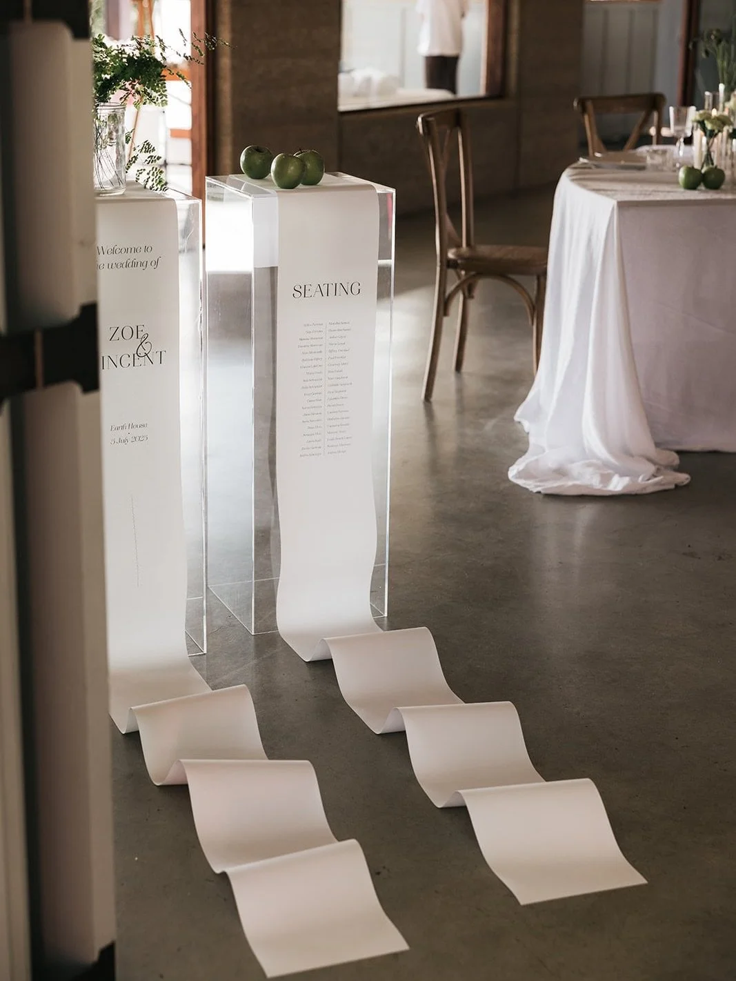 There is something so poetic about the way a paper trail hits the floor, and clear acrylic plinths are the perfect &ldquo;invisible&rdquo; canvas to make your wedding signage truly pop.

By using transparent supports, you create a stunning floating e