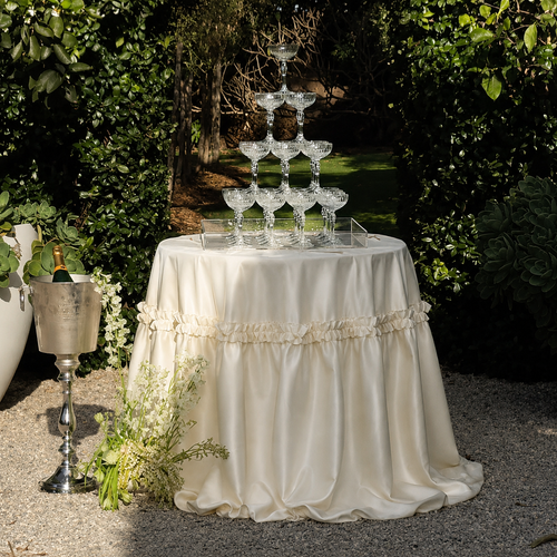 Ivory+Ruffle+table+cloth+_+Champ+Tower.webp