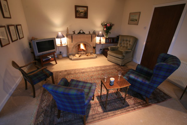 Woodlands Cottage Sitting Room, holiday lets perthshire, holiday homes dunkeld, glasgow, aberdeen, tay fishing, corporate reward weekends, corporate breaks, scottish salmon fishing, river tay, .jpg