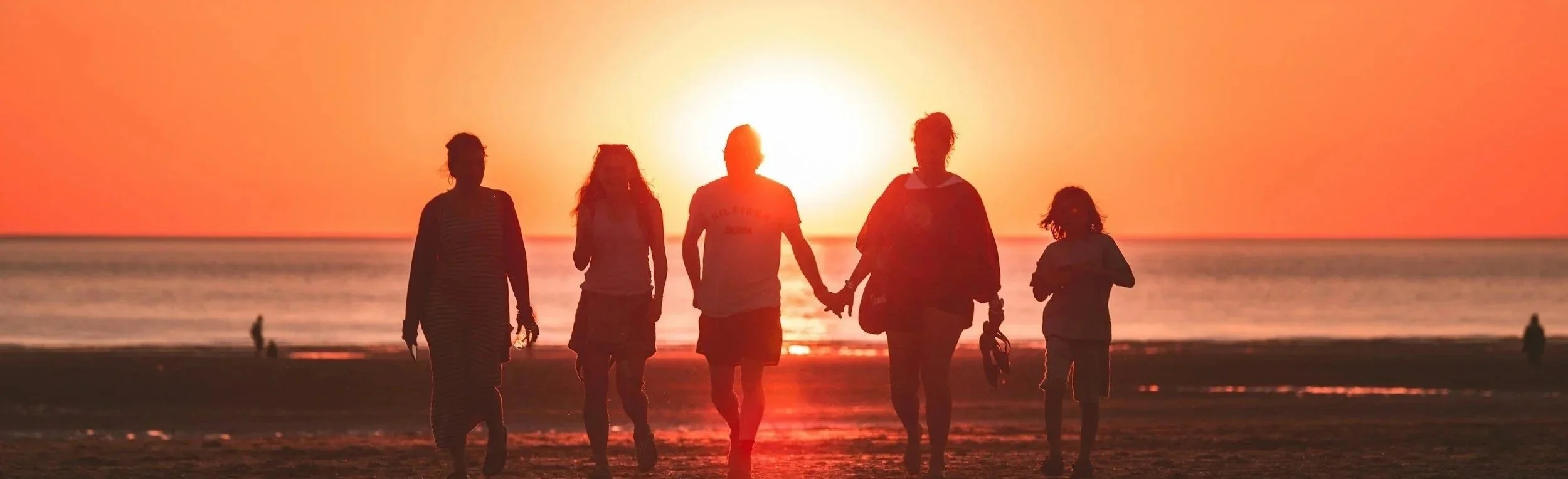 Family at sunset representing immigrant families pursuing the American dream.jpg
