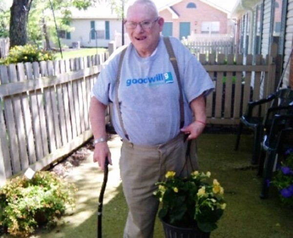 Parkmead resident Donald Frazier with begonias