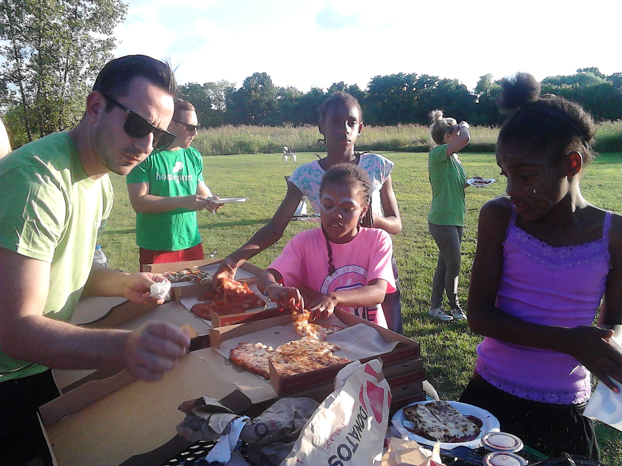 Dr. Josh Grosshandler dishes up pizza