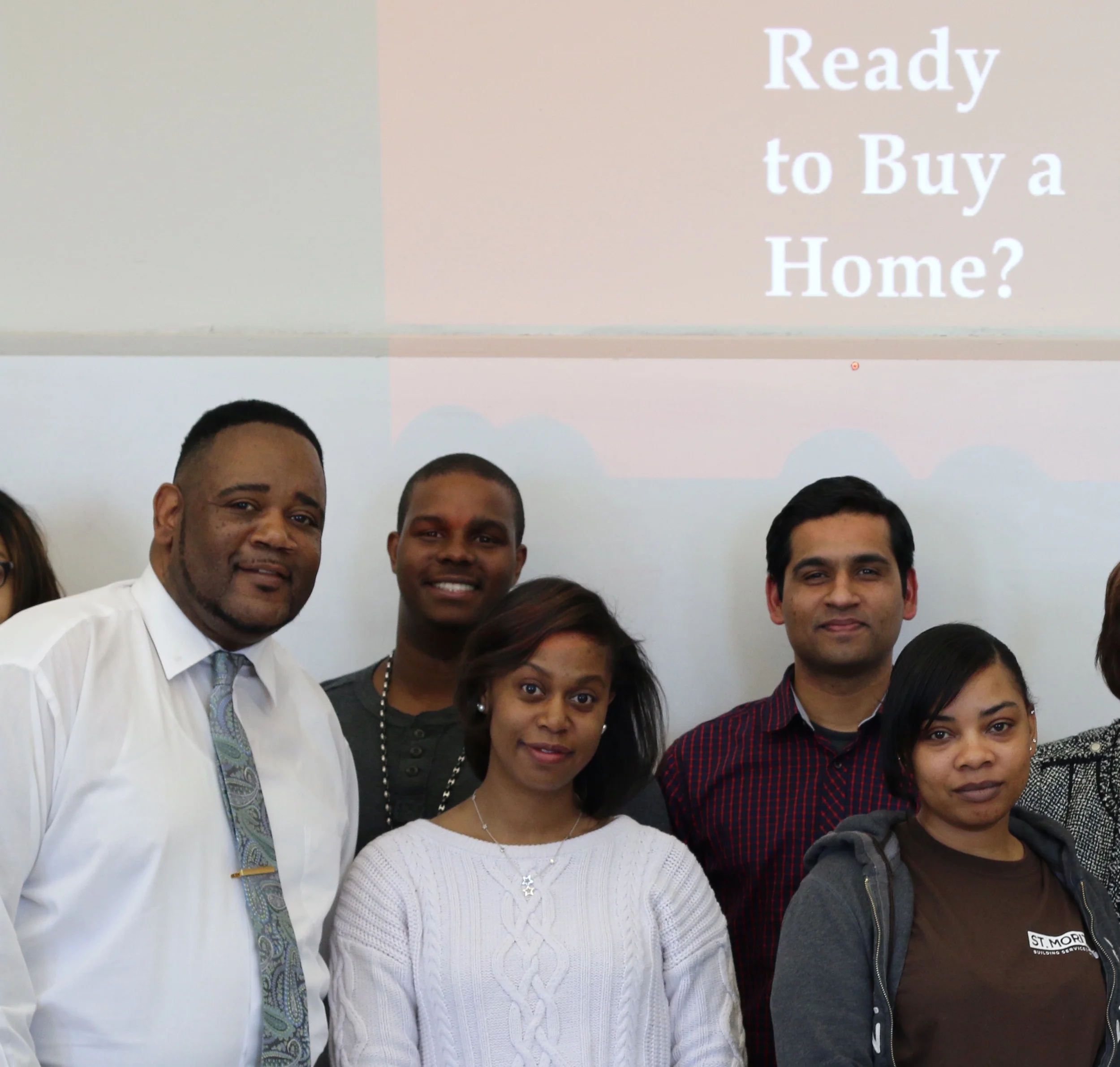 Homeport instructor Kerrick Jackson, left, and Homebuyer Education class