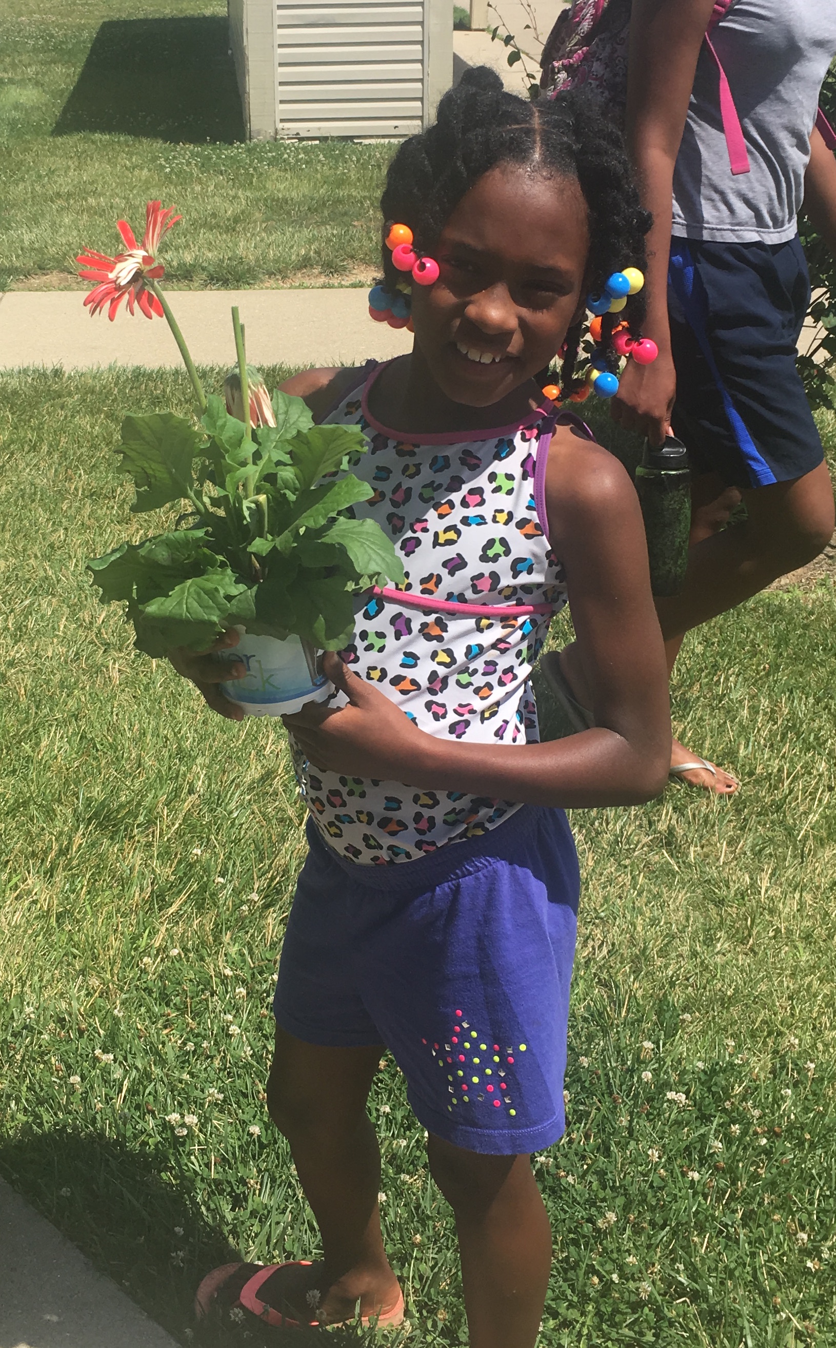 Pheasant Run's Aniyah Banks got a flower for her mom.