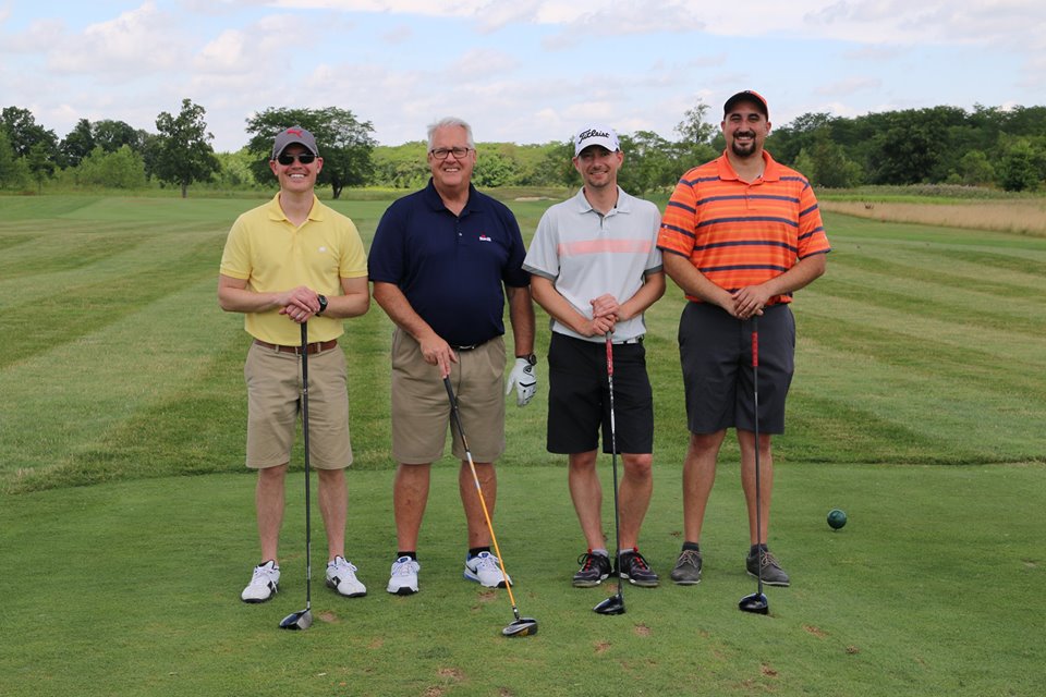 Homeport Project Manager Justin Metzler, left, joined a group from Ruscilli Construction Co. and American Structurepoint Inc.