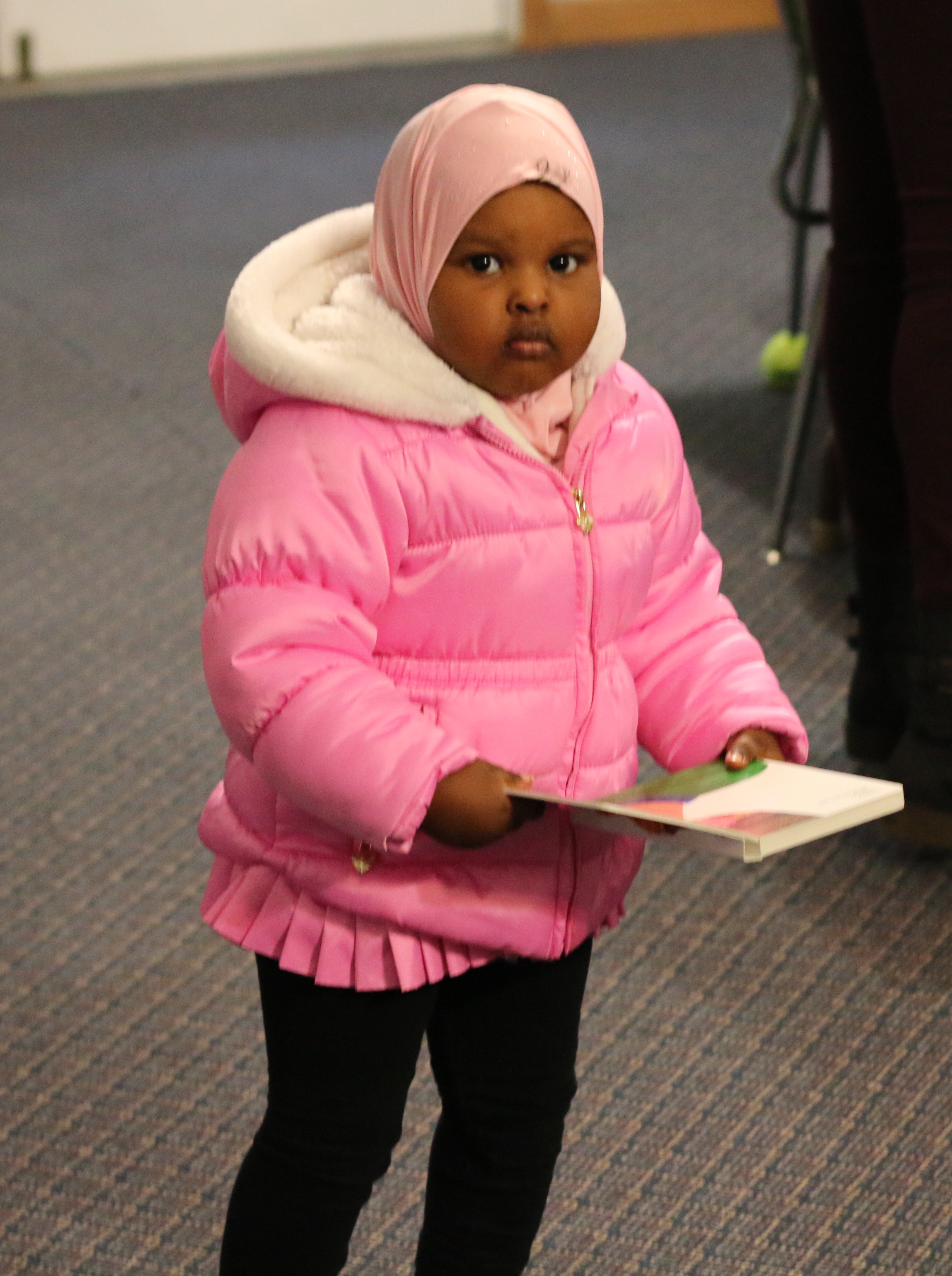A young reader at Emerald Glen