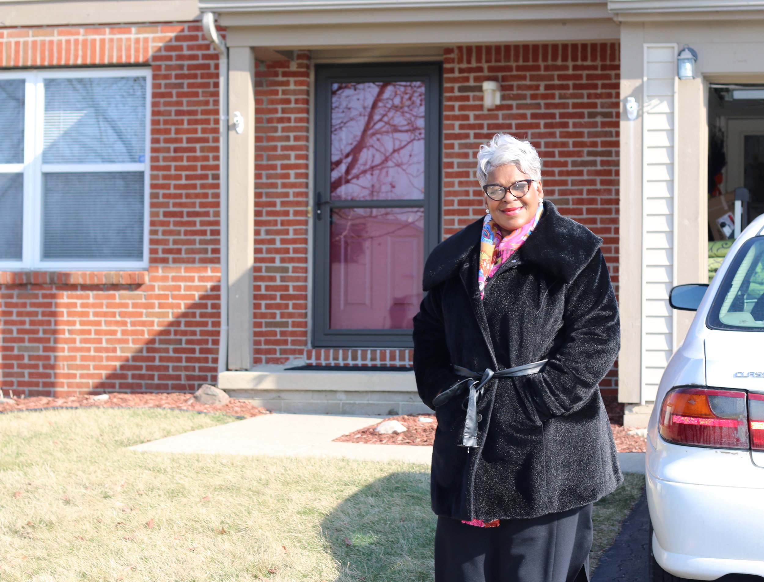 Linda Powell outside lease-option home she purchased the end of 2016.