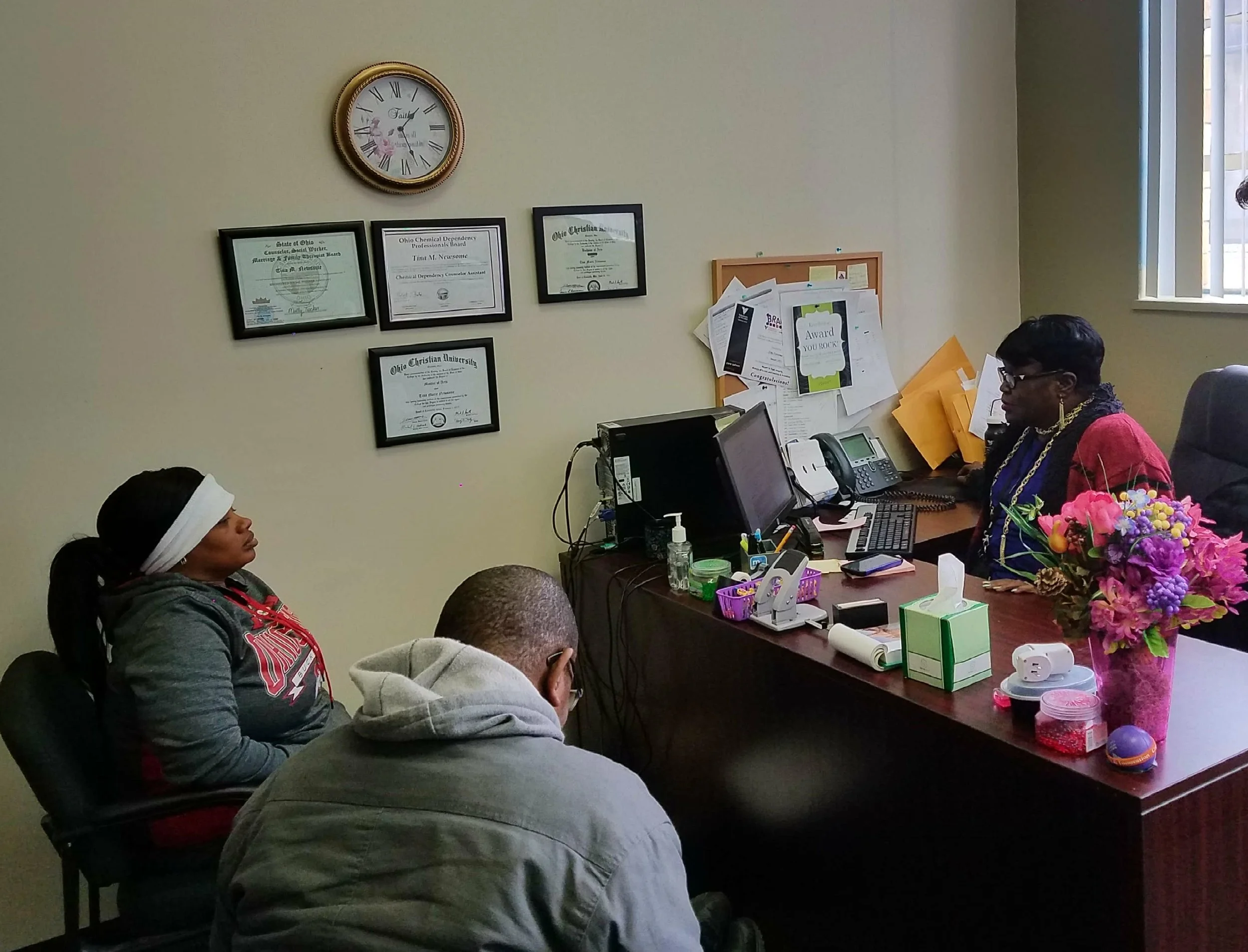 Veterans & Families First program clients meet housing counselor Tina Newsome.