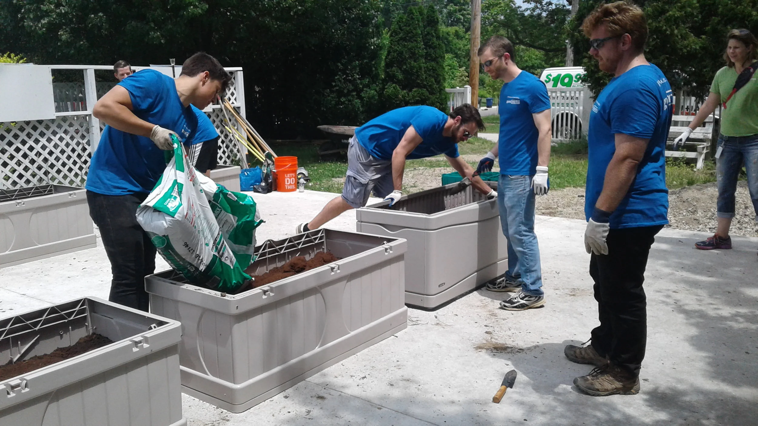 J.P. Morgan Chase employees building flower beds.