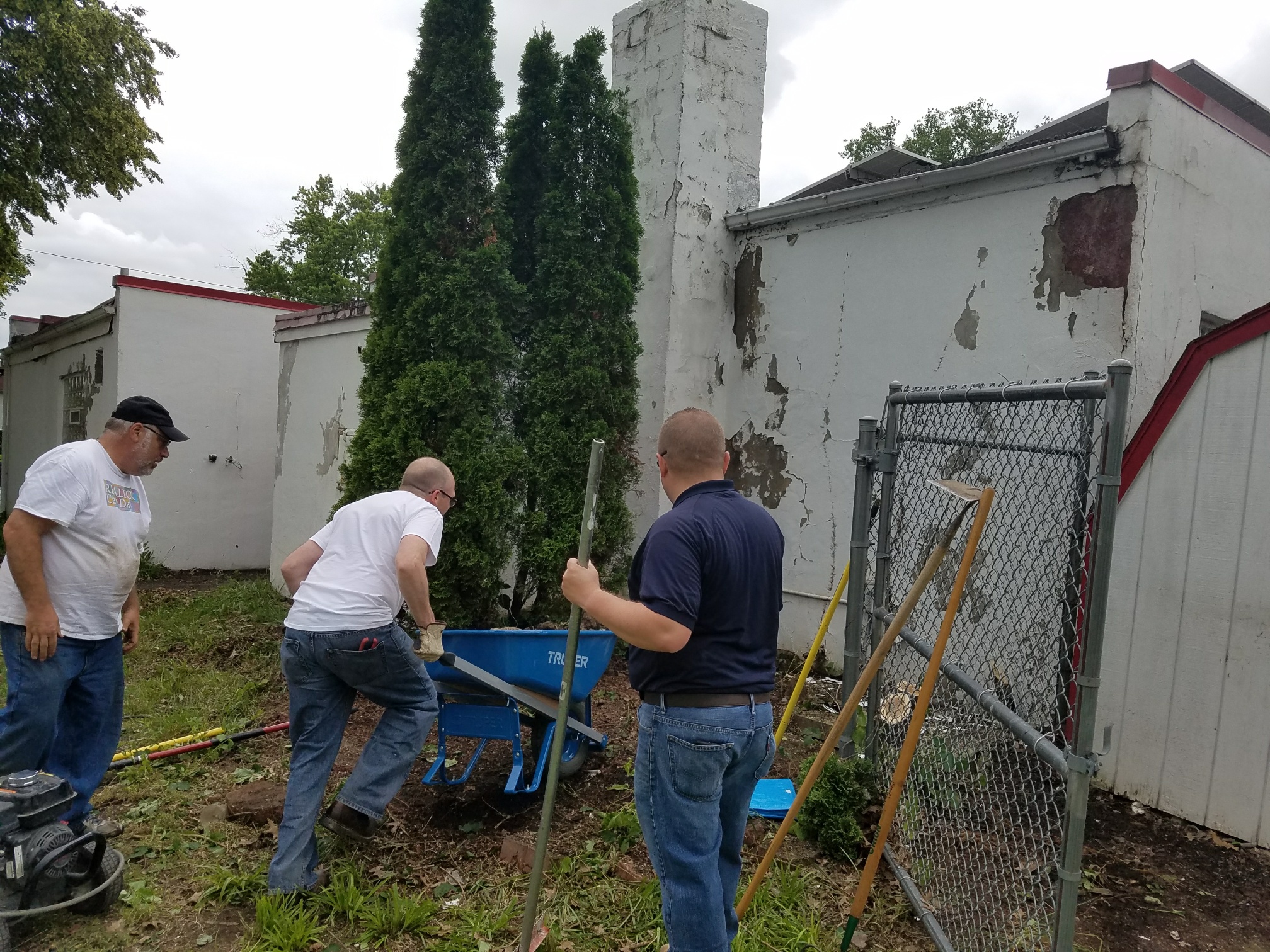 CCIIR members cleared nuisance trees as part of their cleanup efforts at American Addition.