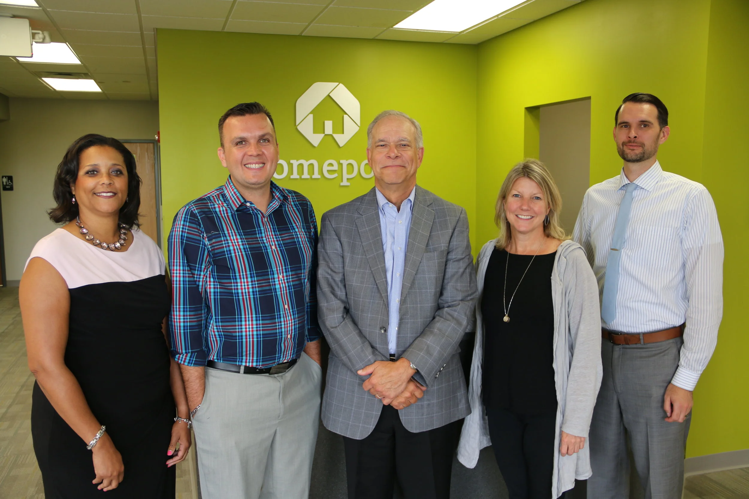 Bank of America Senior Vice Presidents Johnathan Northup, second from left, and Jennifer Hurd, second from right. 