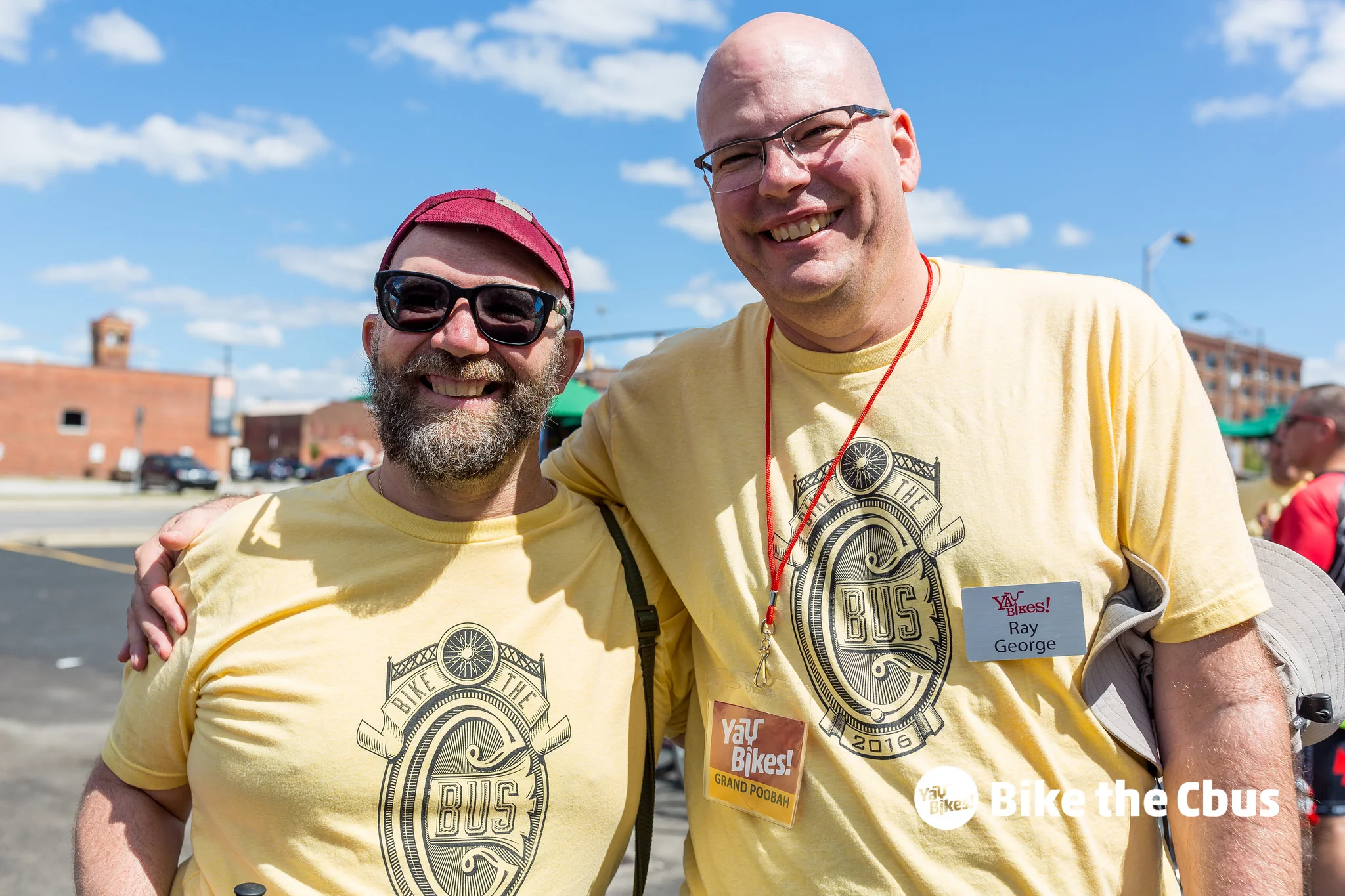 Nik Olah, volunteer, left, joins Ray in the fun at the 2016 Bike the Cbus hosted at Elevator Brewing . In addition to being the founder, Ray's official title was Grand Poobah.