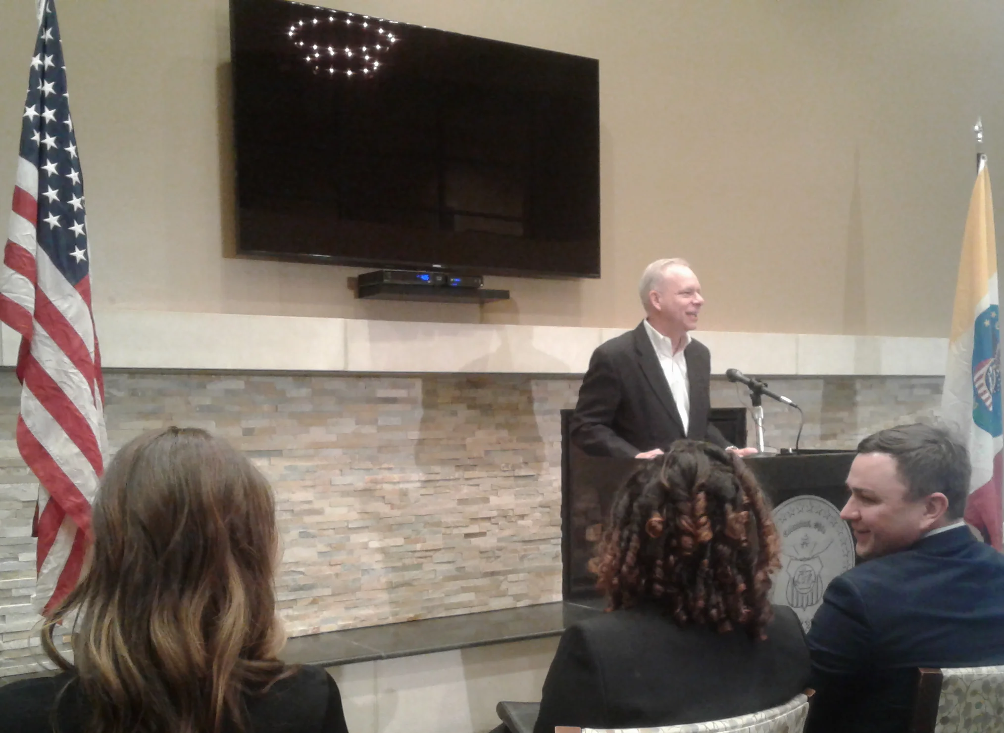 Homeport President & CEO Bruce Luecke inside Poindexter Place. Seated in front of Bruce are Council Members Elizabeth Brown, Jaiza Page and Michael Stinziano. 