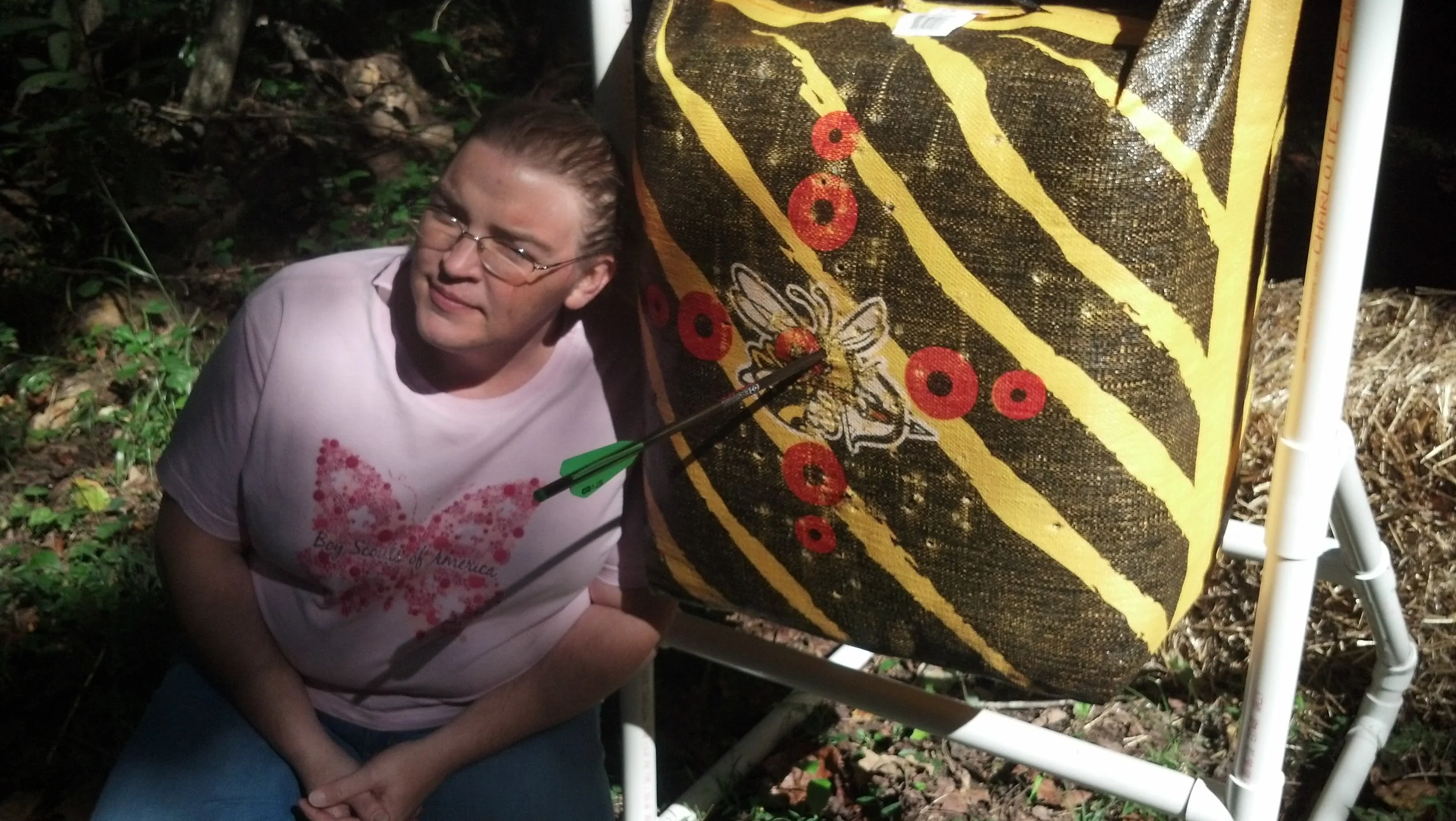 Jeney hit a bullseye on her first archery attempt at a Boy Scout event near Athens. 