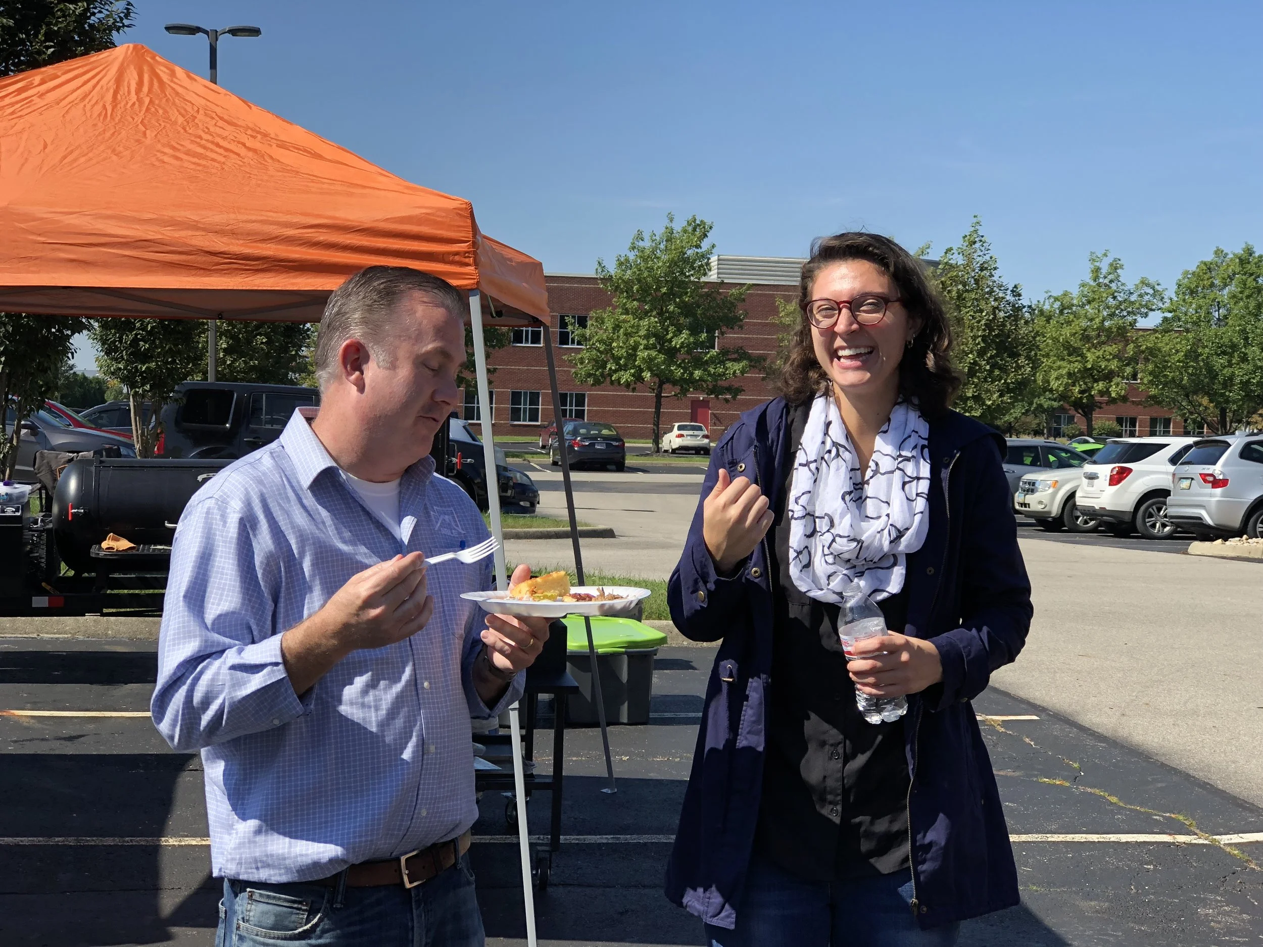 Georgie Asfoura chats with Homeport Board Member Mike Lange at Homeport staff picnic.