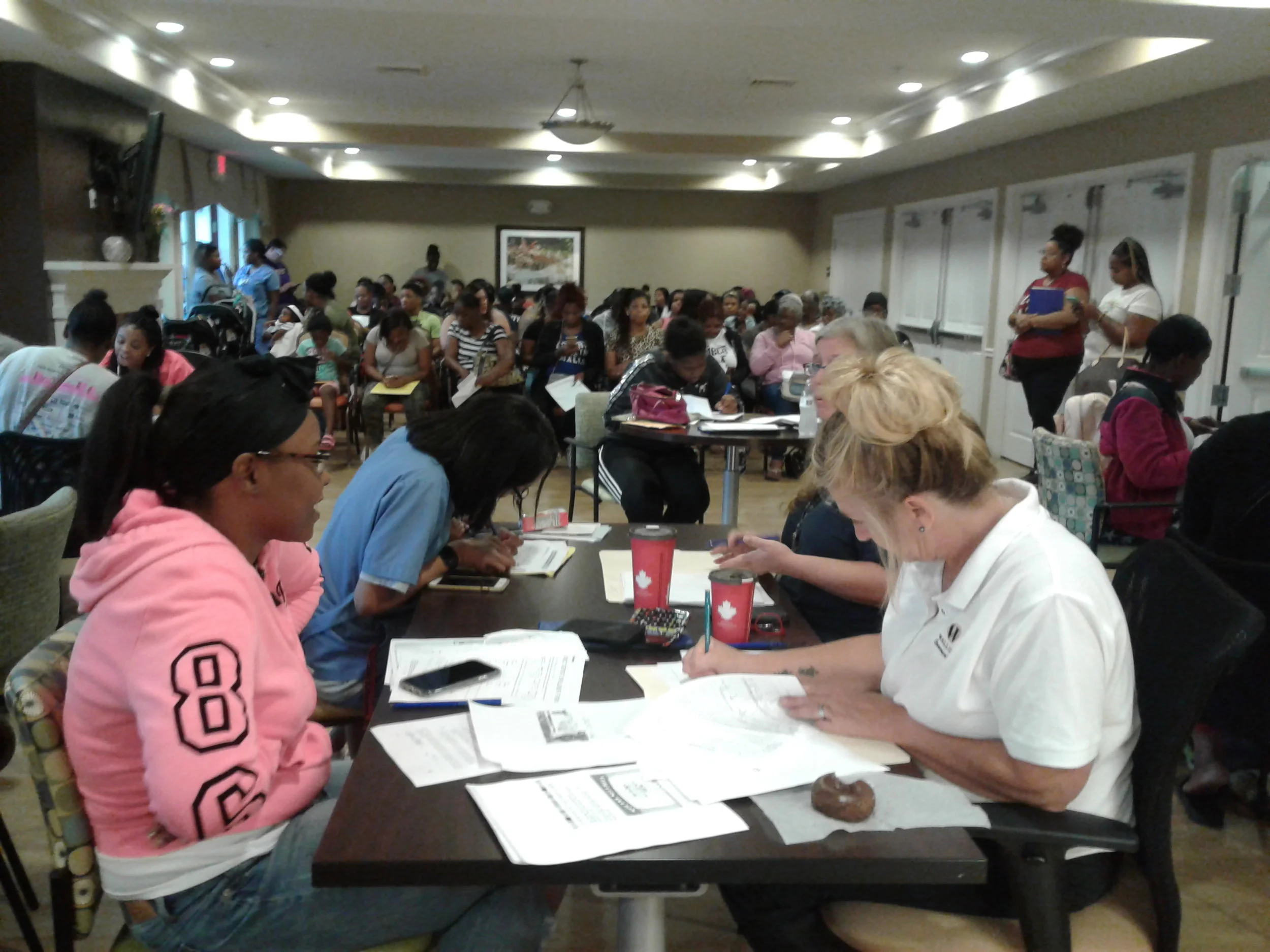 Applicants for Homeport’s Blacklick Crossing development in Reynoldsburg filled the intake room set up at Eastway Village apartments in Whitehall.