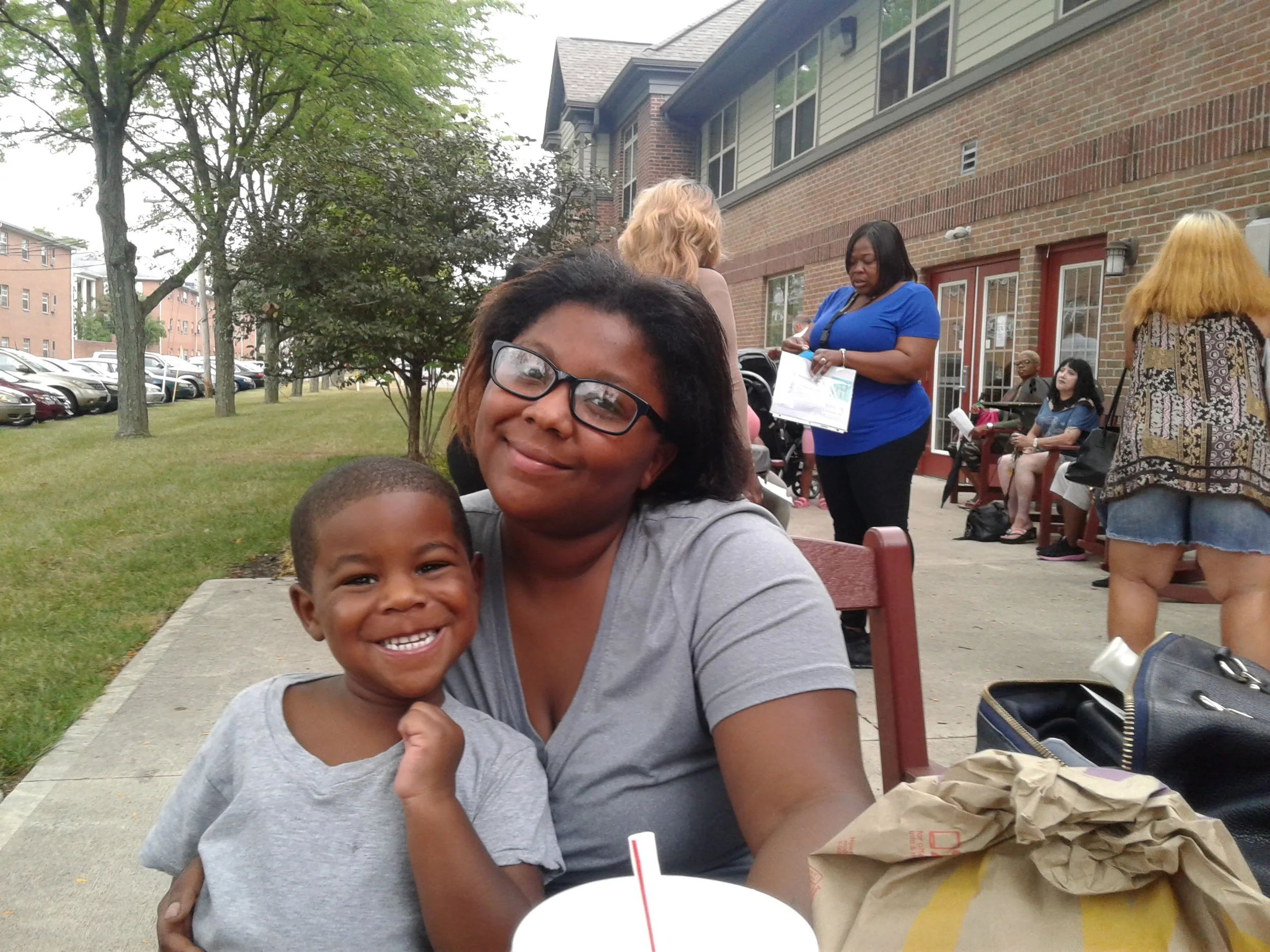 Quotaisha Frazier and her four-year-old son Christopher Jackson were among the early arrivals.