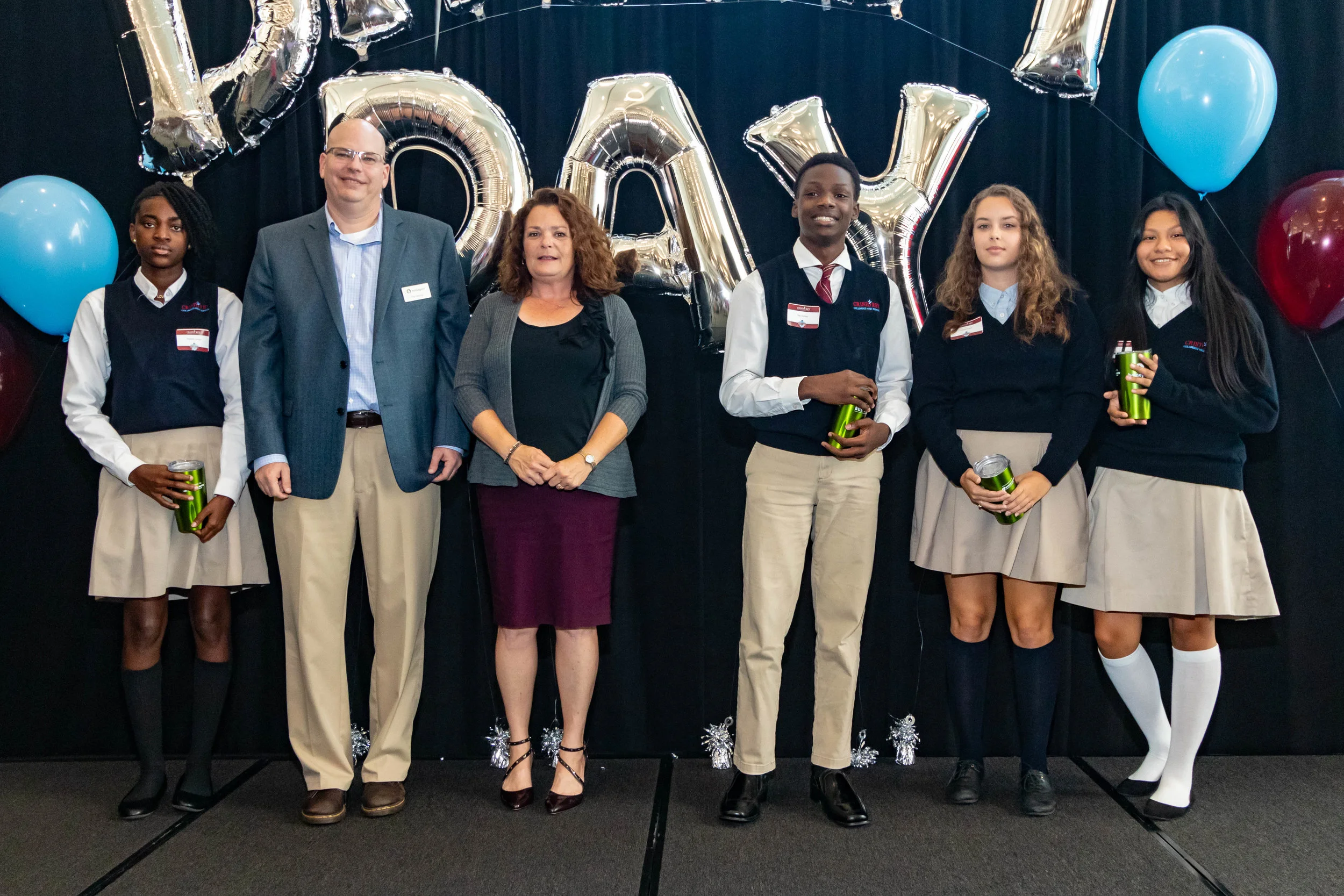 Homeport’s Ray George and Tammy Lowks greet work-study students for 2019-2020 school year.