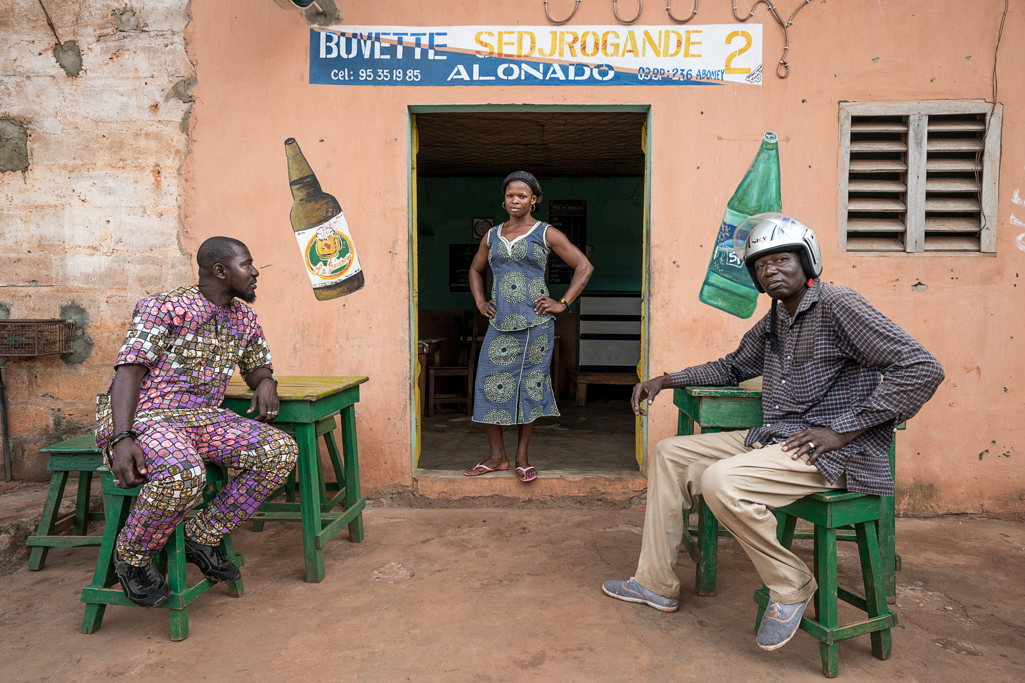 Benin_2000_Two men with woman in a bar.jpg