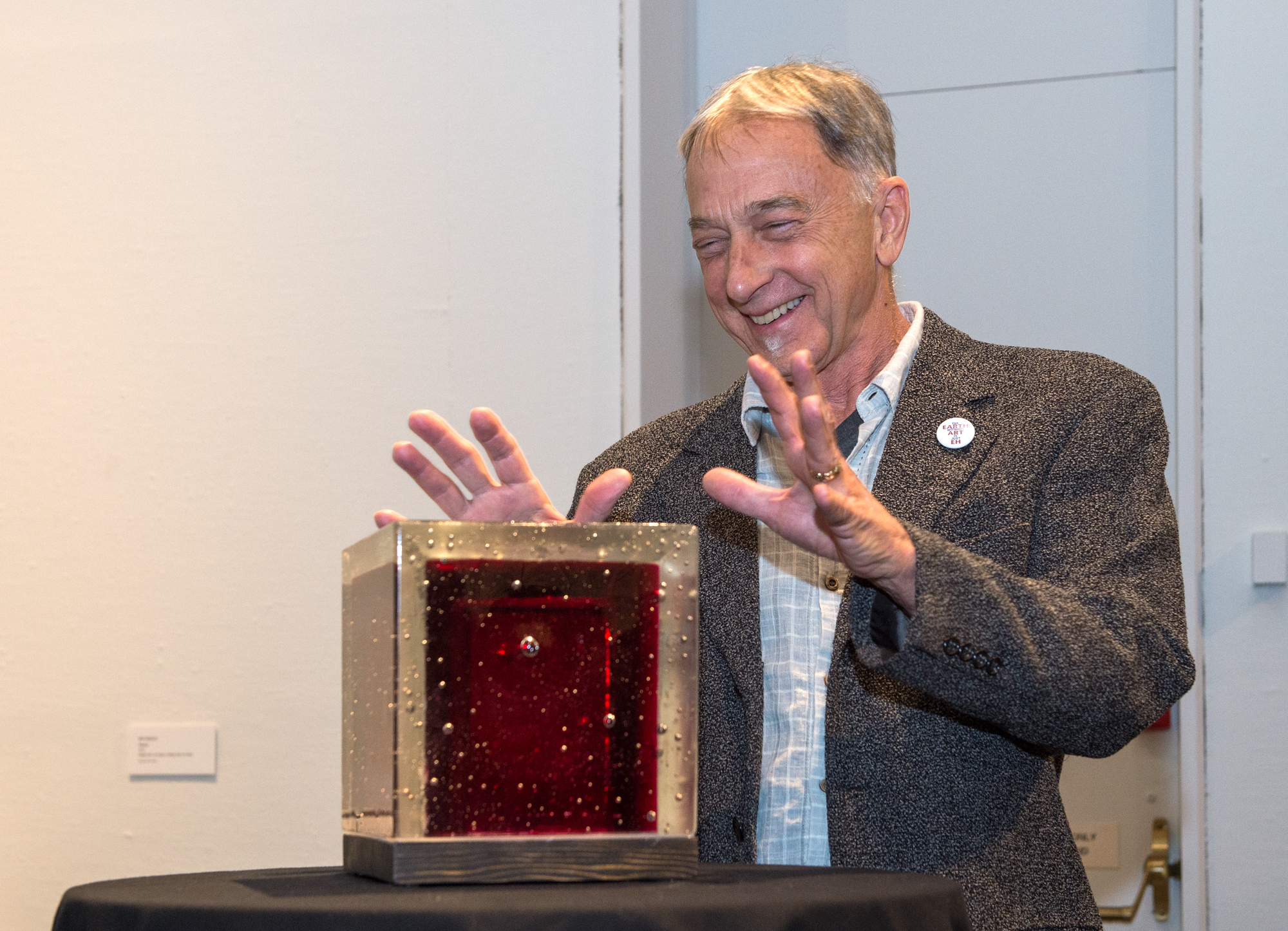Chris Bruce, Director, Museum of Art/WSU receives a farewell thank-you gift from Olson Kundig and museum staff 