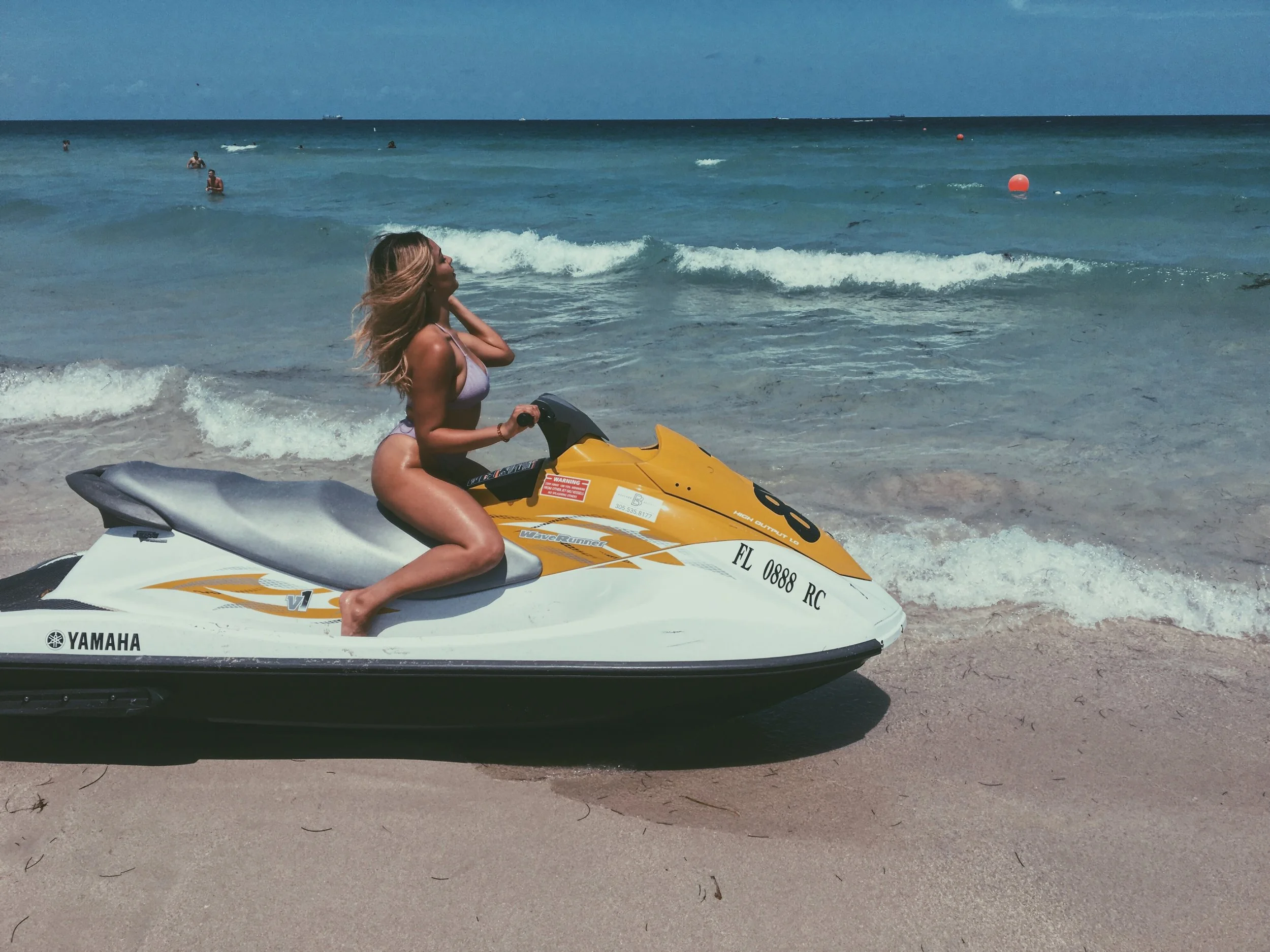 jet skiing costs about $60 for half an hour on miami beach- or you an just sit on one for free :)