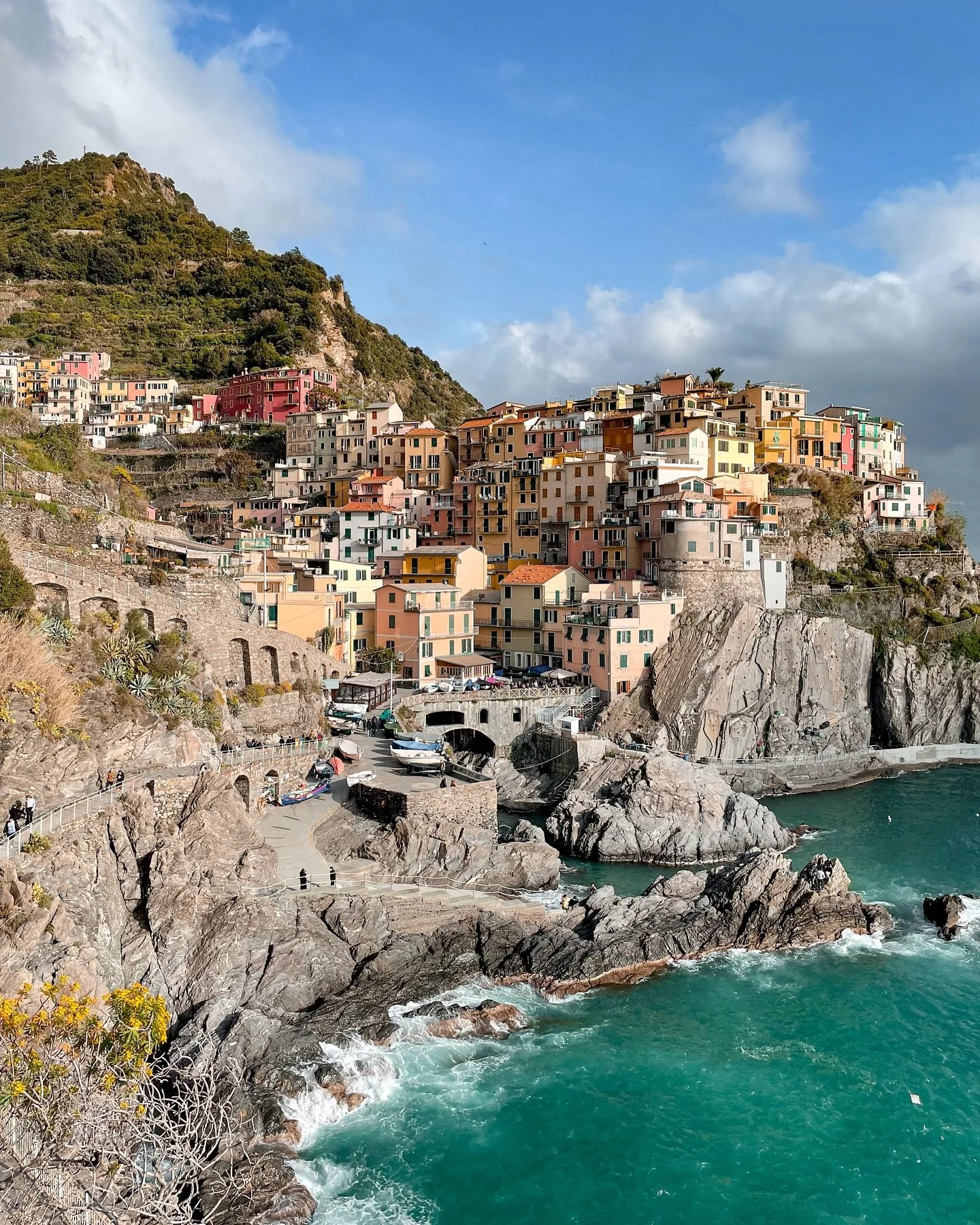 🎨 Postcards from Manarola, in all its full technicolour glory.

One of Italy&rsquo;s recognisable pastel fishing villages, Manarola feels both postcard perfect and a little unkempt too, with windows flung open and laundry dancing in the sea breeze.
