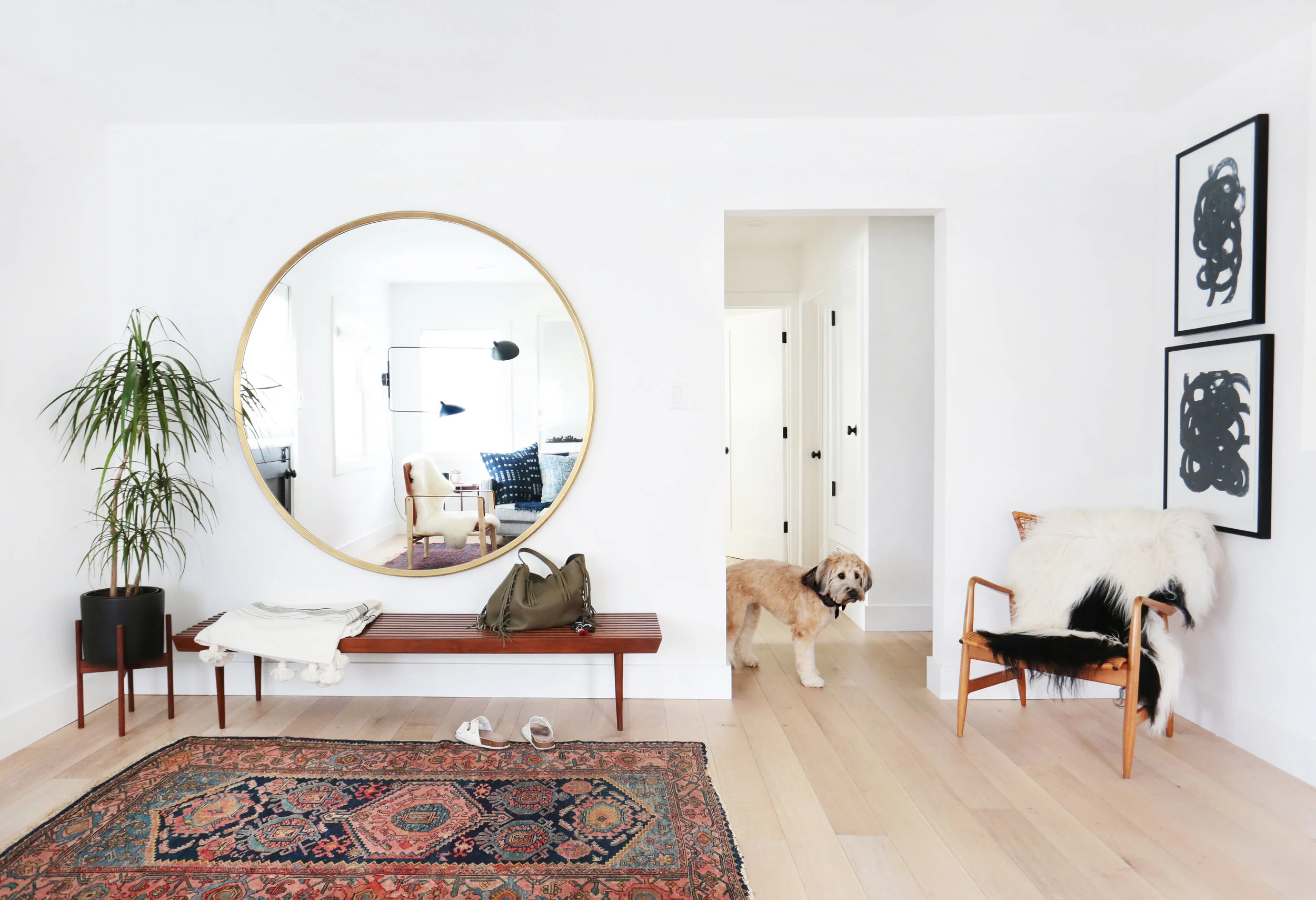 Amber Interiors - See how the lighter floors just brighten up the whole space? 