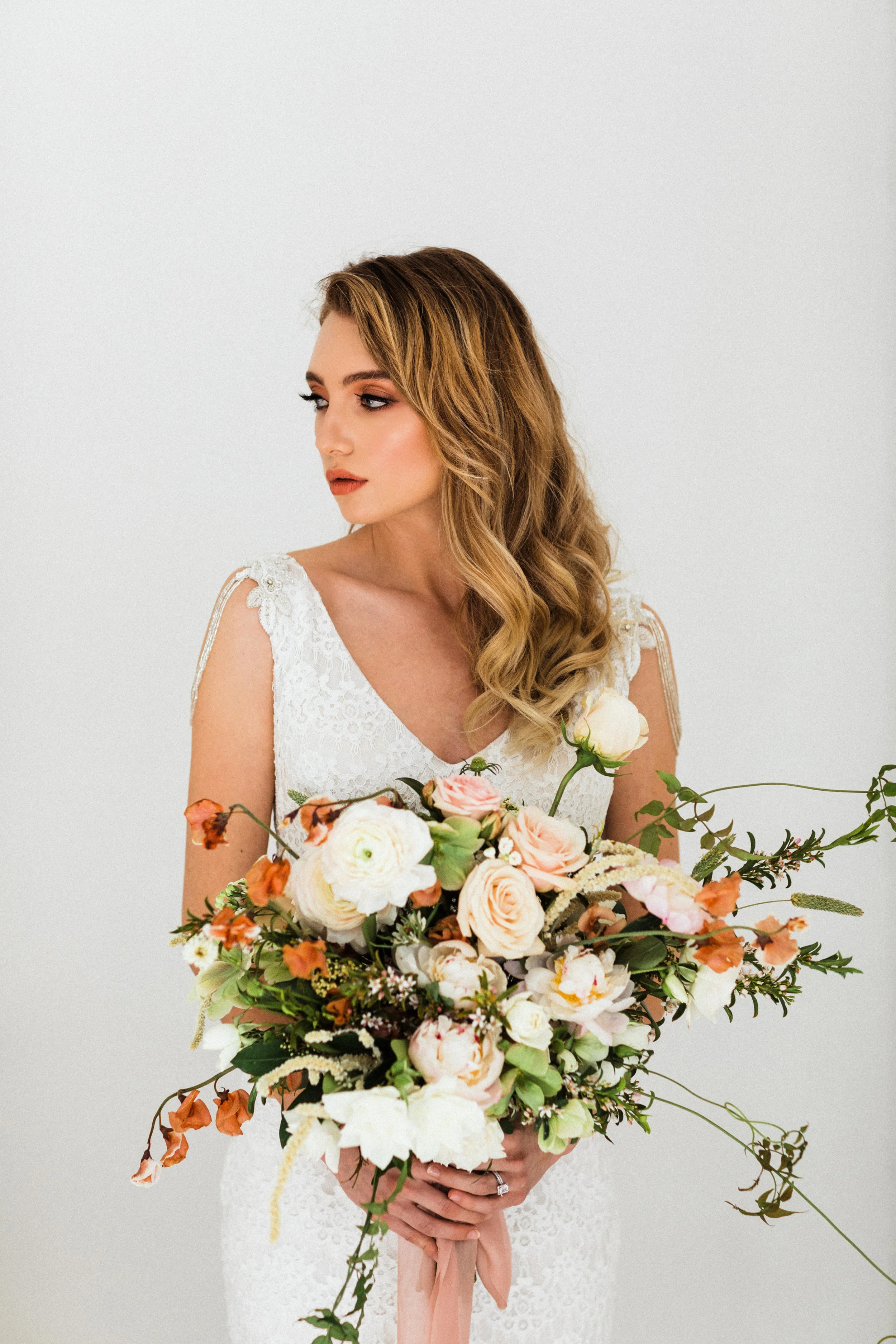 Hair and makeup by Anh Photo by Hubert Huy Photography Planning, Styling, and Florals by Love & Sparrows Events Vintage Rentals by Rent My Dust Dress by A and Be Dallas / Willow by Watters Venue by The Lumen Room Rings by Nasr Jewelers / Tacori Model: Kennedy Micall