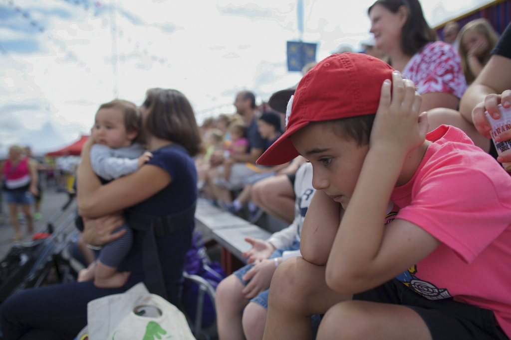  Isaac Elbayadi, 6, covers his ears during his family's visit to the circus at the New York State Fair in Syracuse, N.Y on Aug. 28, 2015. 