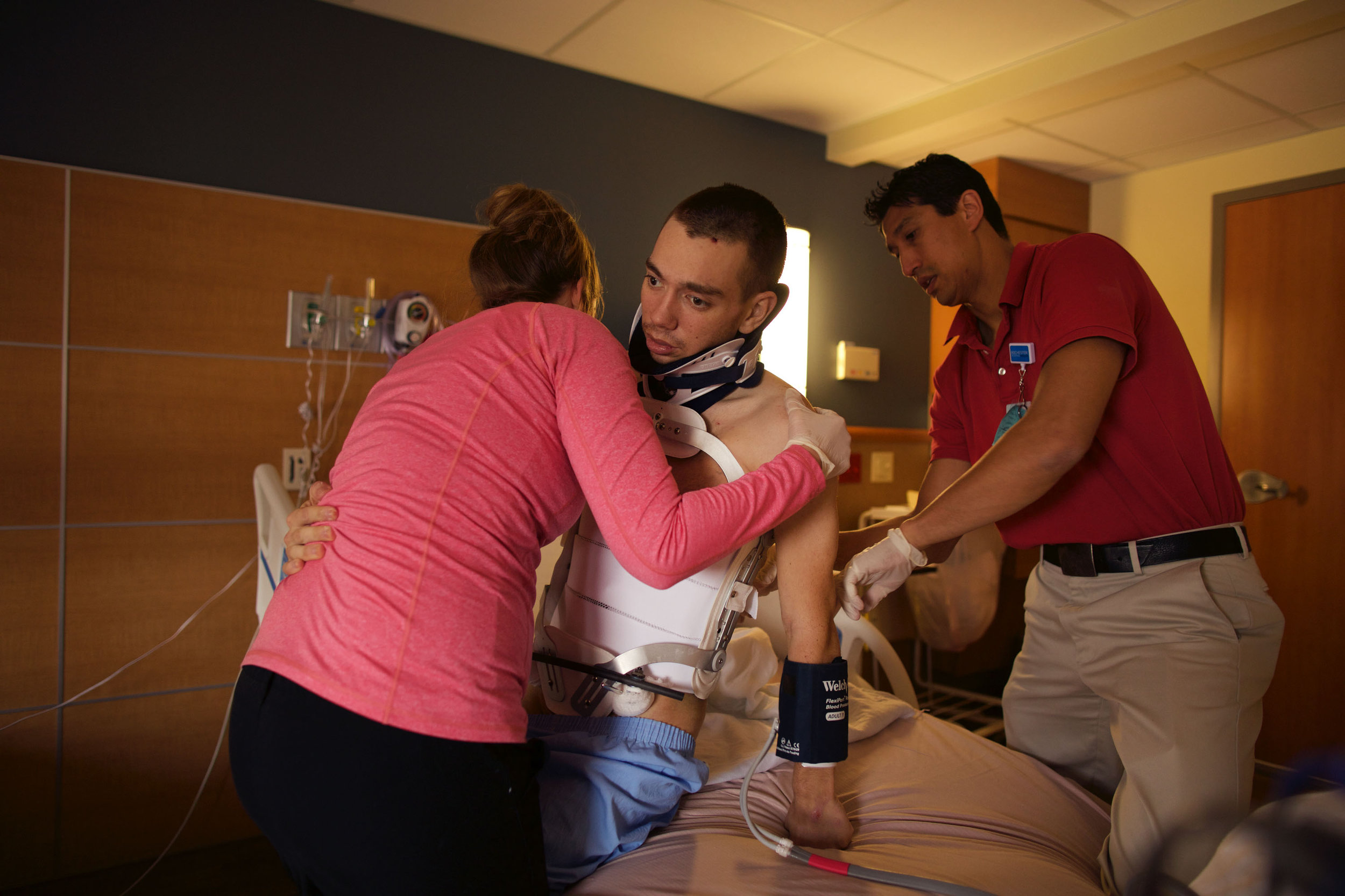  Doctors at Golisano Rehab Center help Chris get into bed on March 3rd, 2016. 