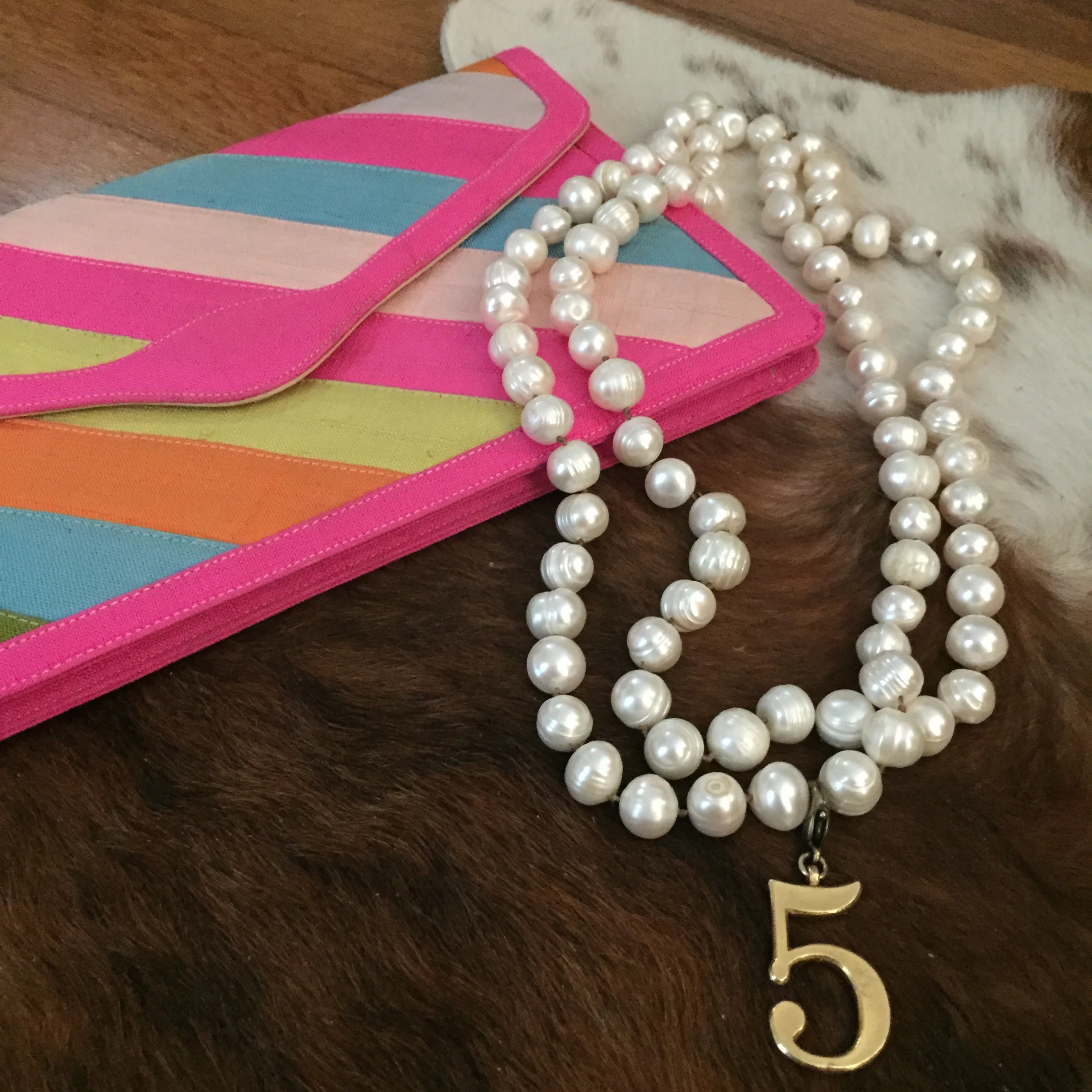 I love pearls, vintages clutches, and the number 5!