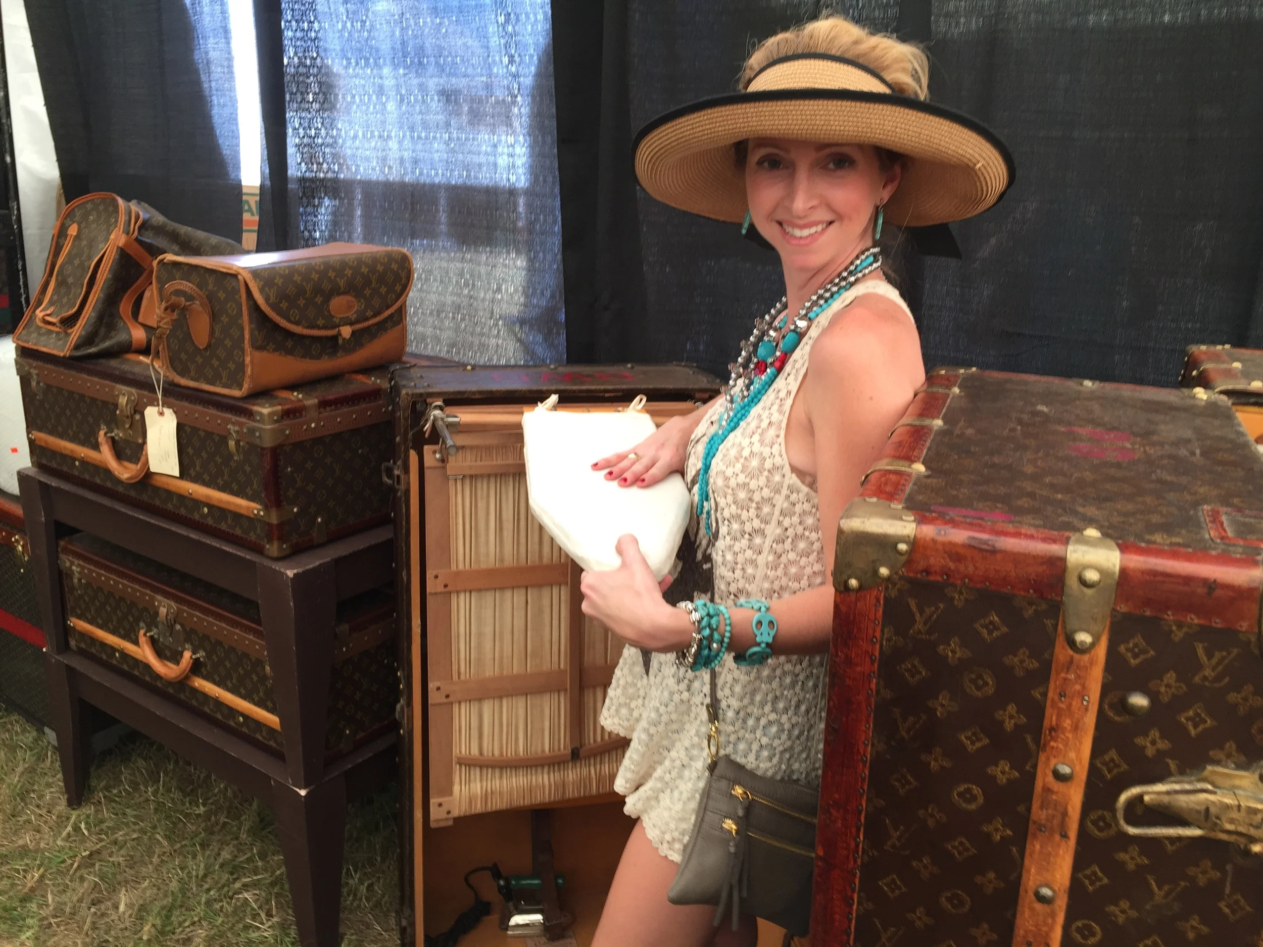 They had a whole booth dedicated vintage designer handbags and half of that was dedicated to Louis Vuitton {of course}. These antique trunks, go for $14.000 to $16,000...Aren't tiny houses the going thing right now? I'll just move into one of these...I mean it has an ironing board, what else could I need? {But really, how gorgeous would one of these be as a coffee table?}