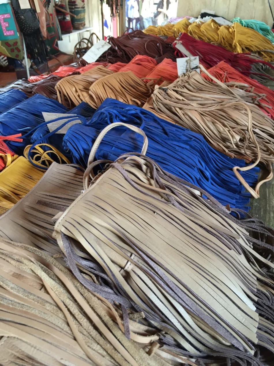 If you don't follow fashion, or have been living under a rock...Fringe is back in a BIG way! It is everywhere and on everything. Clothing, shoes, purses, basically anything that will stand still. It sure was alive and kicking in TX.