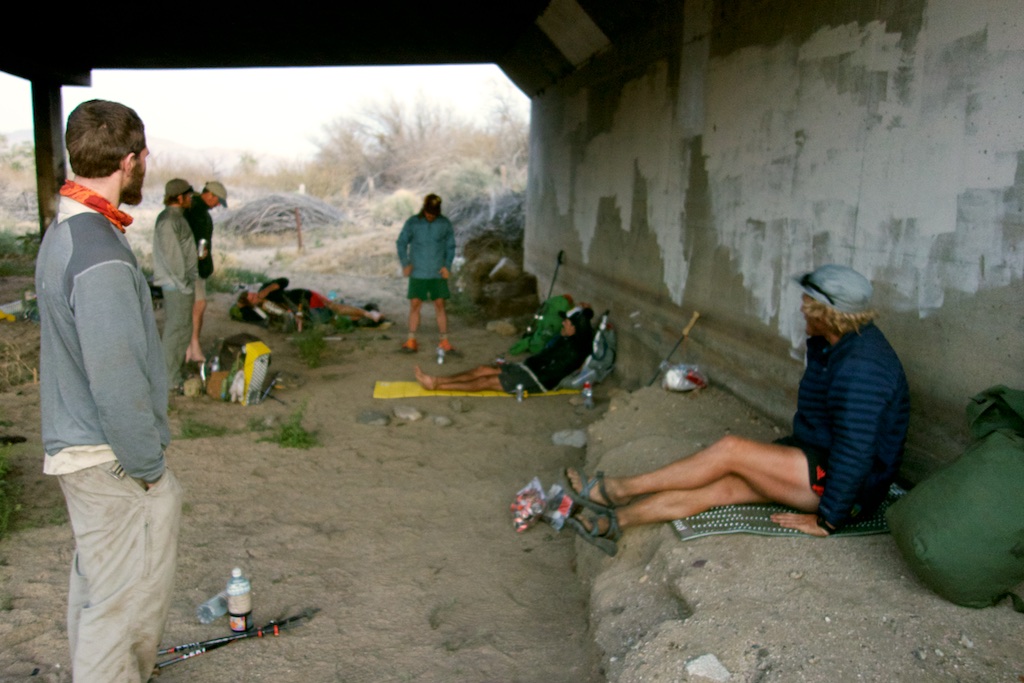 Thru-hikers affectionately referred to as "hiker trash" living the dirt bag lifestyle under the bridge at Scissors Crossing, CA.