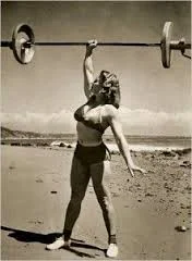 women barbell overhead 1950's.jpg