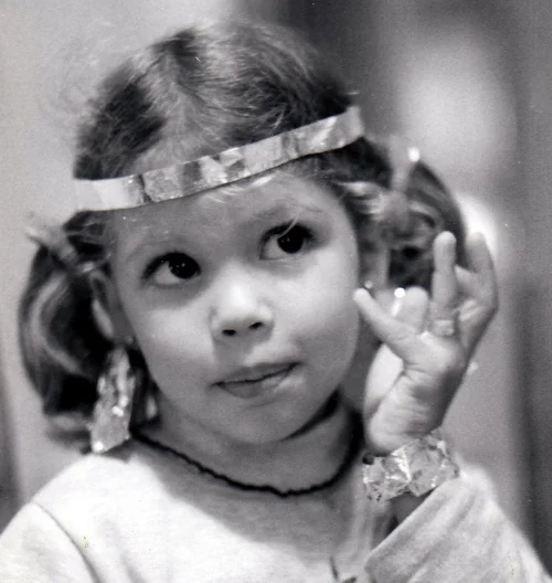 The artist at age 4 making jewelry using tin foil circa 1977