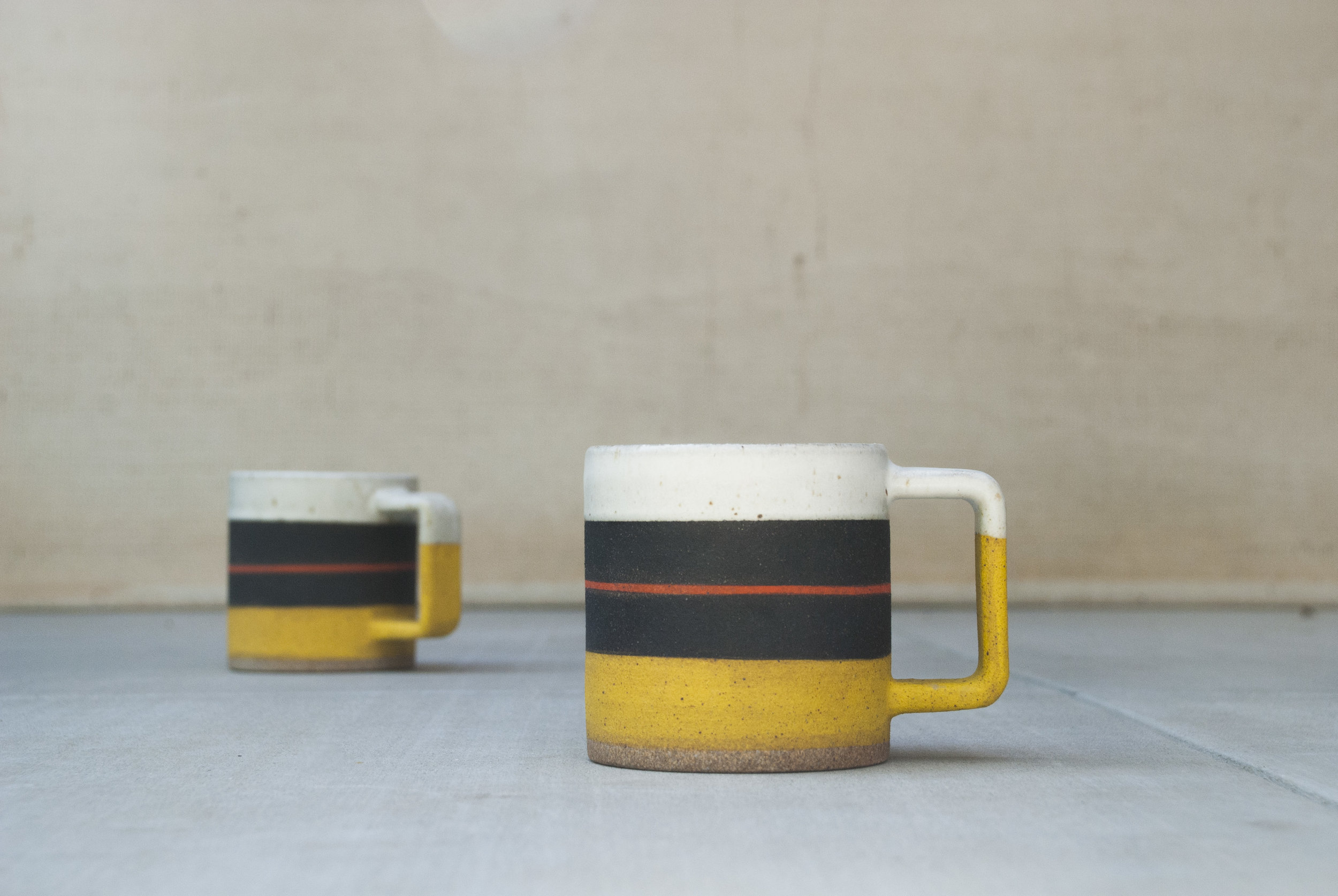 Yellow and black stripe mugs.jpg