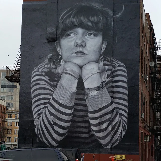 This #mural(?) can be found on #Broadway and #Bedford by the #Williamsburgbridge #art #wallart #blackandwhite #girl #whodidthis #stripes #curls #bangs (at Williamsburg Bridge)