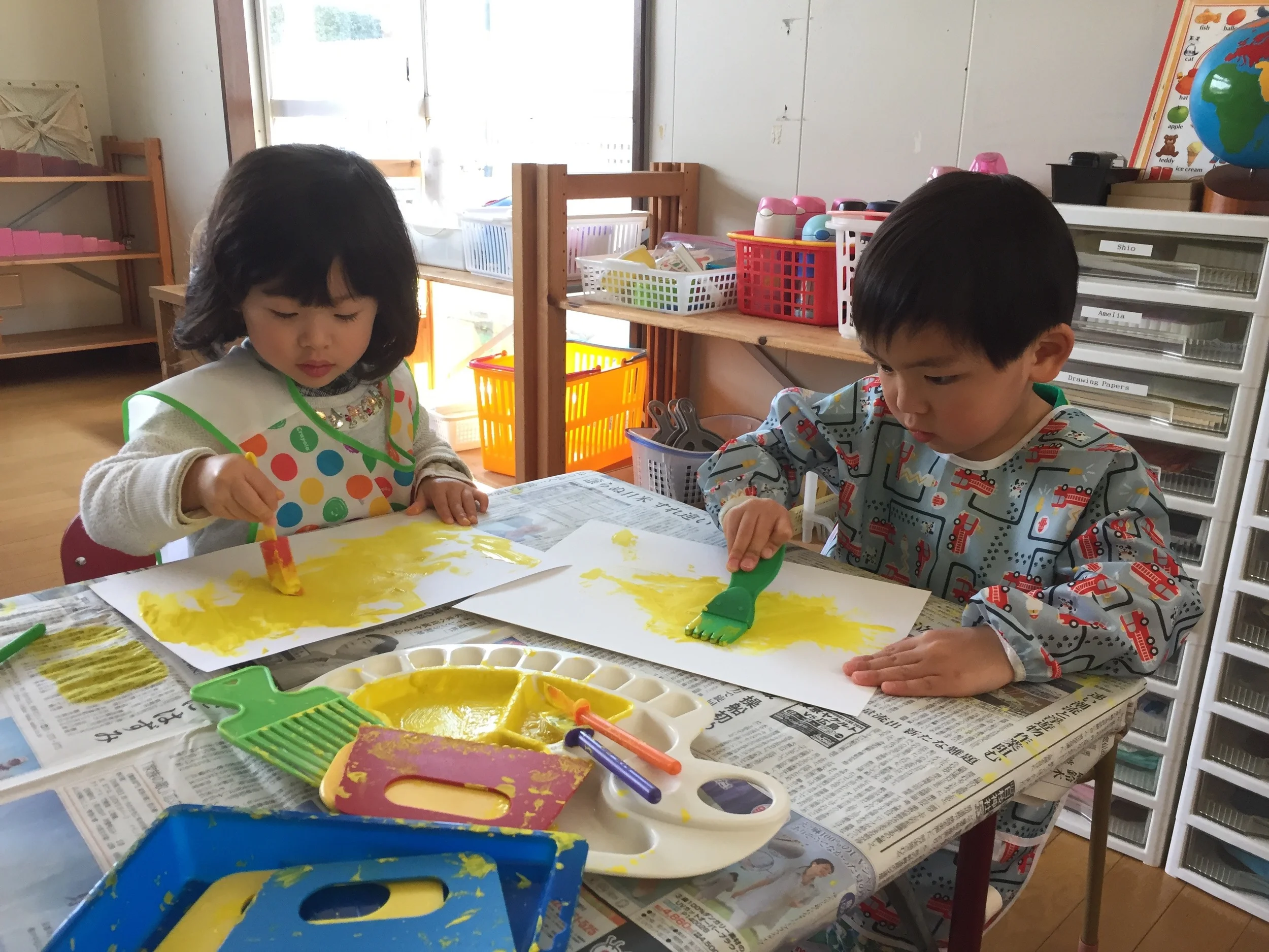 The artists are painting the base color.