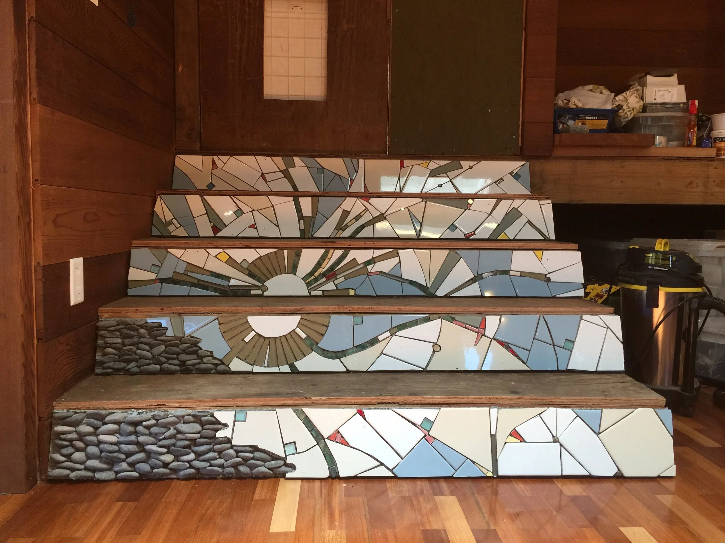 Above: the dandelion stair set is applied to the risers. 