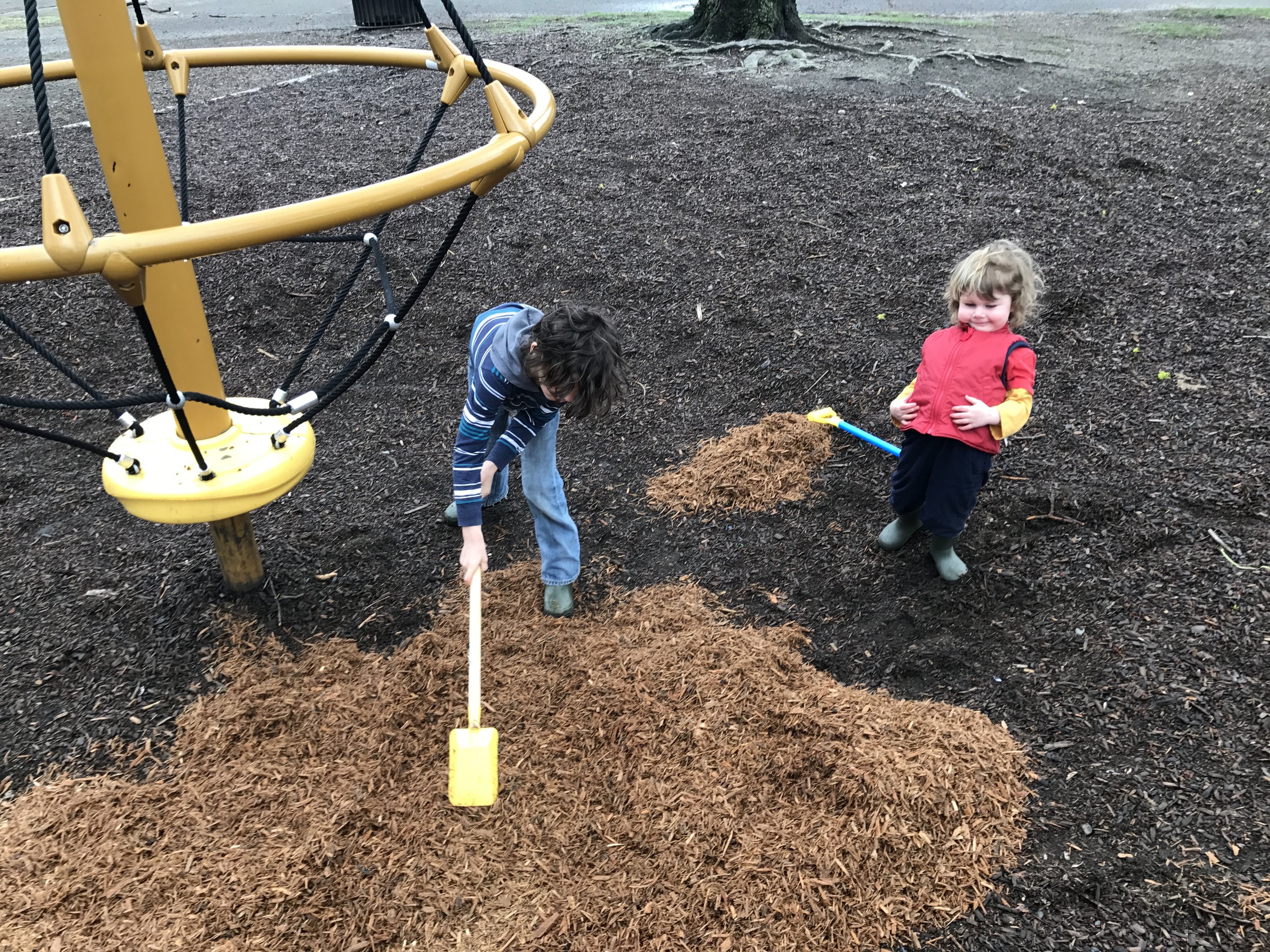  It takes many small hands to spread new playground mulch Photo credit: Caleb Borchers 