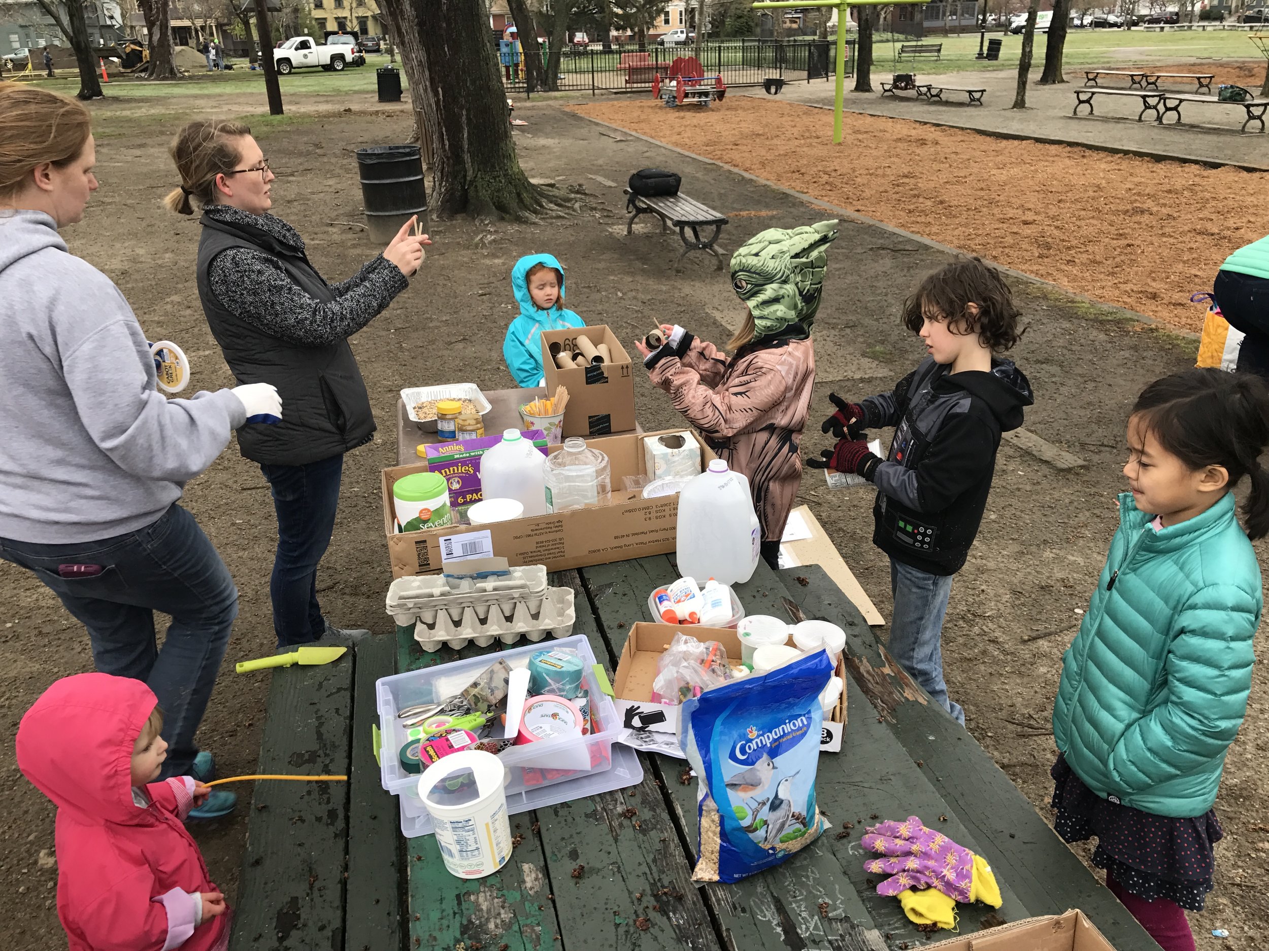  Kids make bird feeders at the Cleanup KidsZone in Dexter Training Ground Photo credit: Caleb Borchers 