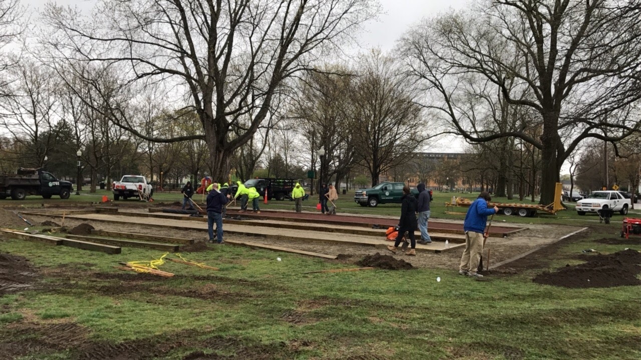 Parks Department works for a few days after the volunteer build to complete the courts