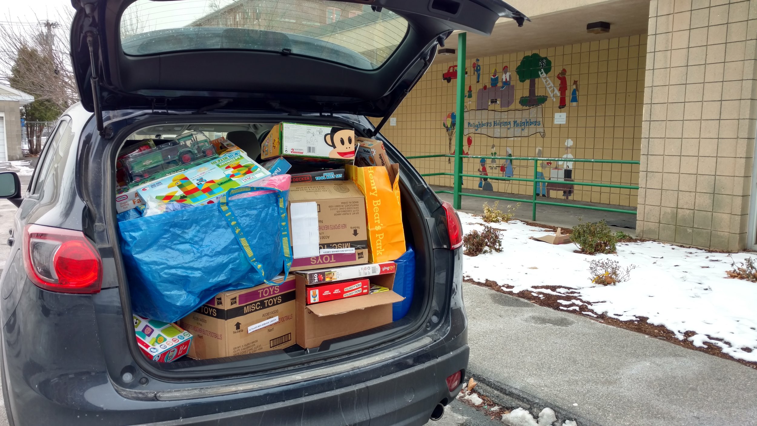  Awaiting helpers from West End Community Center to bring in more than 50 new toys given by neighbors for children in WECC's educational programs 