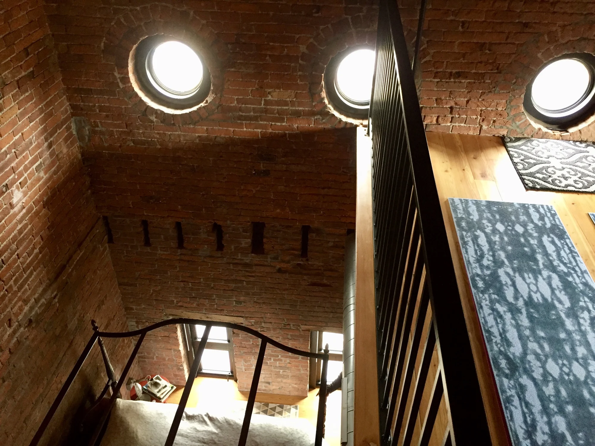 30 foot ceilings and a loft inside the steeple of this former Victorian church building Photo by Barbra Revill