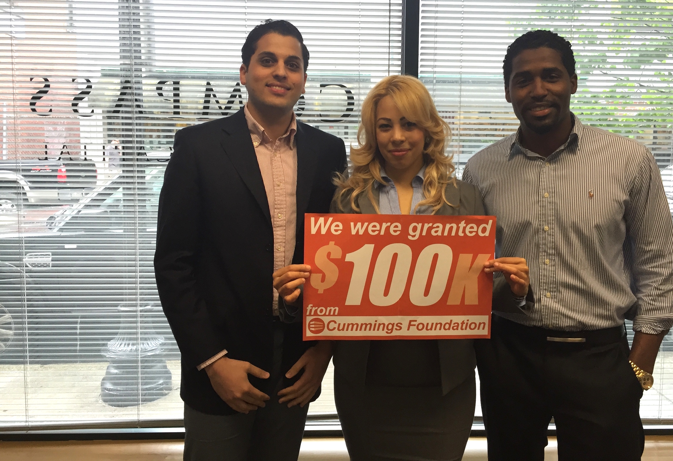 Pictured: The Compass Team in Lynn - Carlos Langa, Sandra Suarez, and Edinson Corporan - celebrating a grant of $100,000 from Cummings Foundation in support of our Lynn FSS Program.